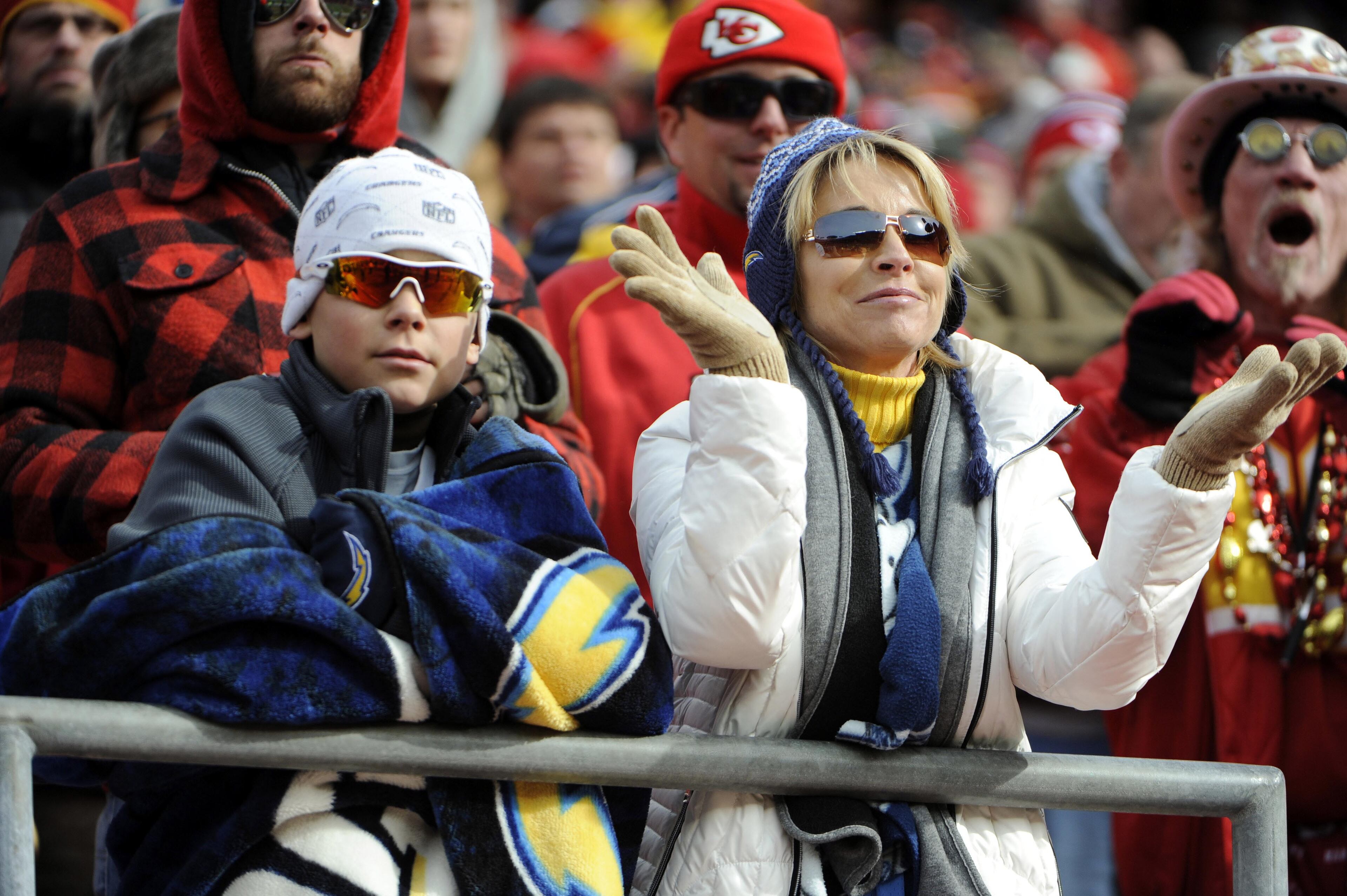 San Diego Chargers fans cheer against the Kansas City Chiefs in the first half at Arrowhead Stadium. San Diego won 41-38. Mandatory Credit: John Rieger-USA TODAY Sports