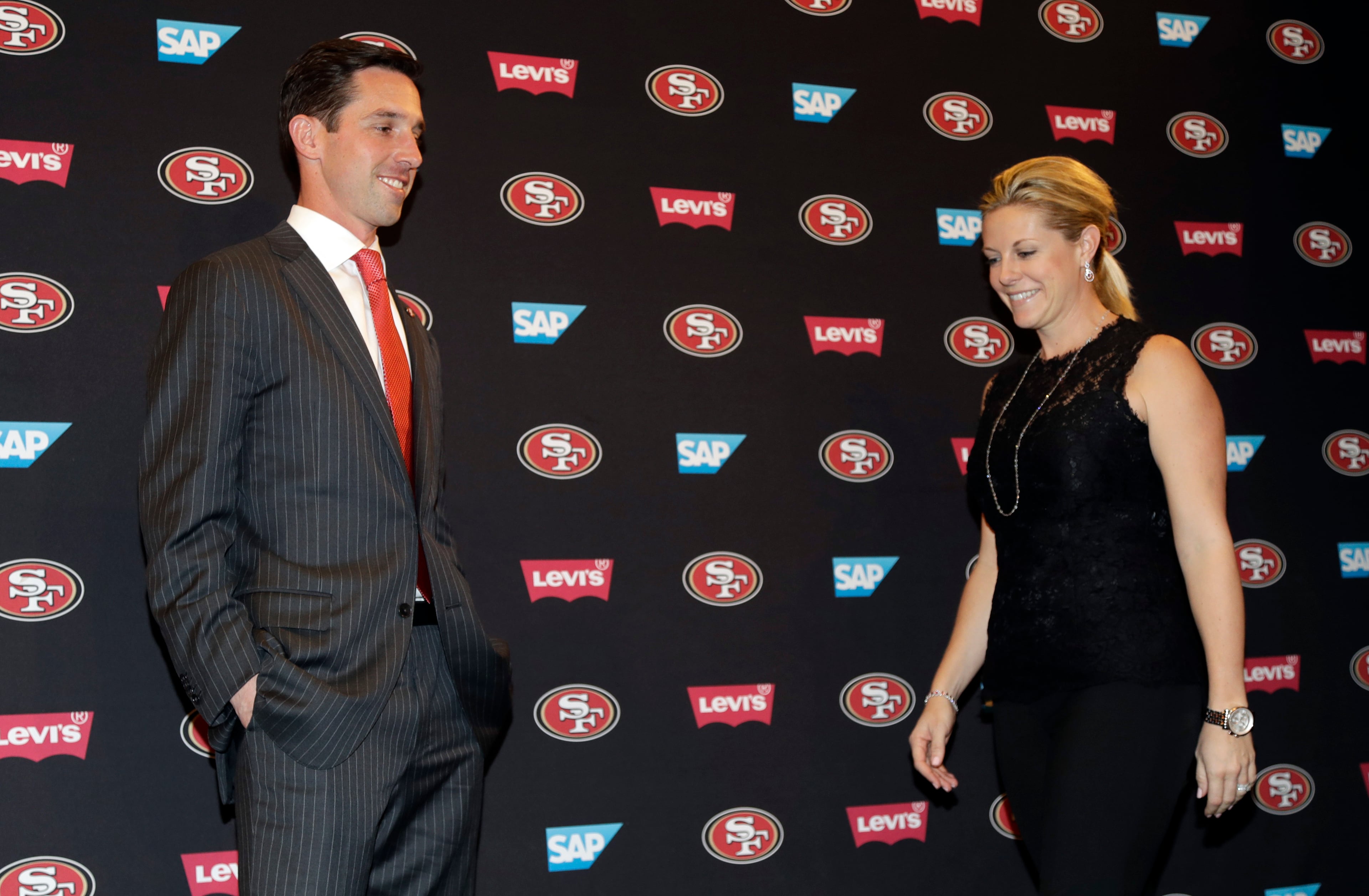 San Francisco 49ers head coach Kyle Shanahan, left, and his wife Mandy in an NFL football press conference Thursday, Feb. 9, 2017, in Santa Clara, Calif. (AP Photo/Marcio Jose Sanchez)
