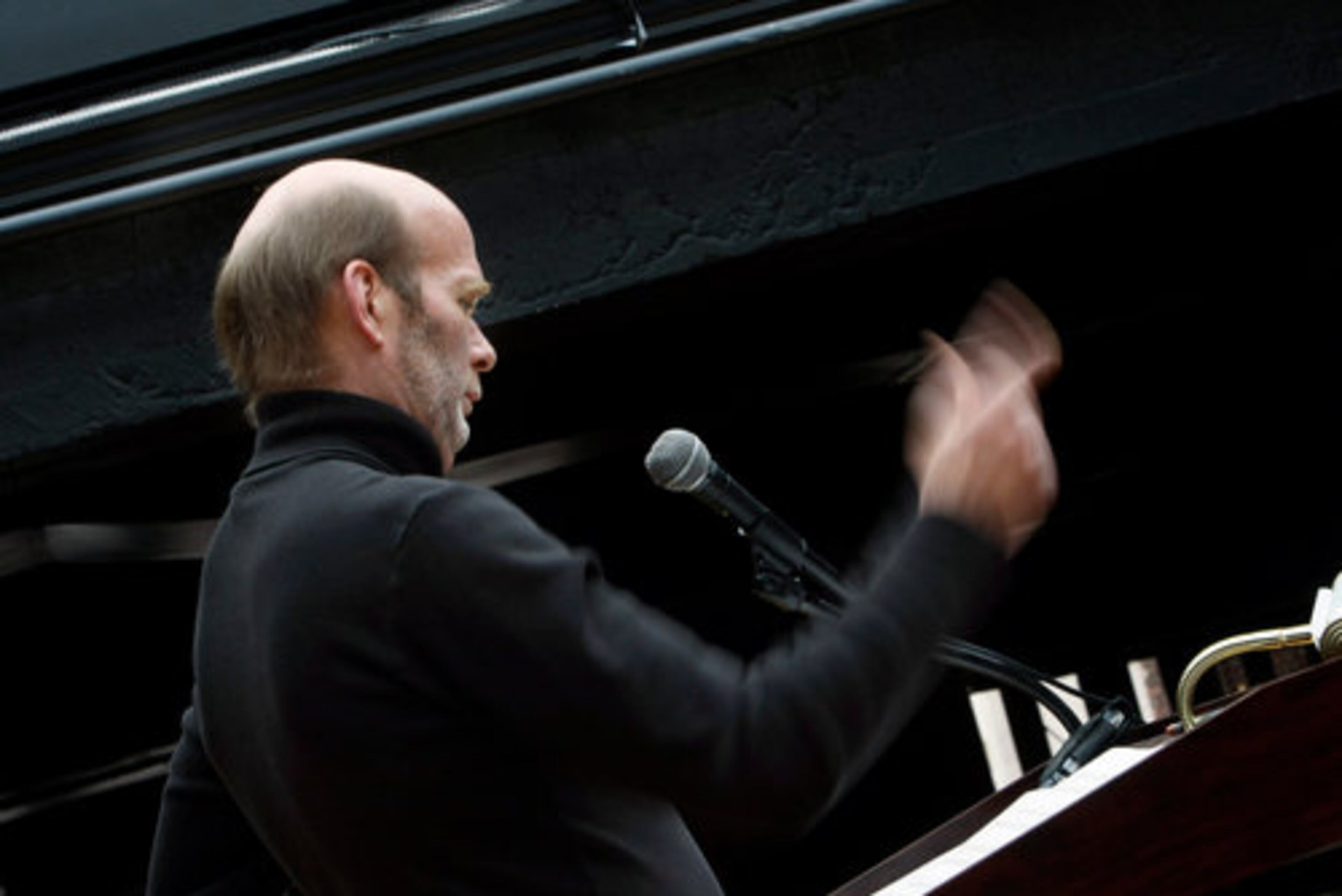 Conductor, Don Strand leads the band Friday. Some 200 musicians came together Friday, Dec. 4, 2009 for TUBACHRISTMAS at Underground Atlanta.