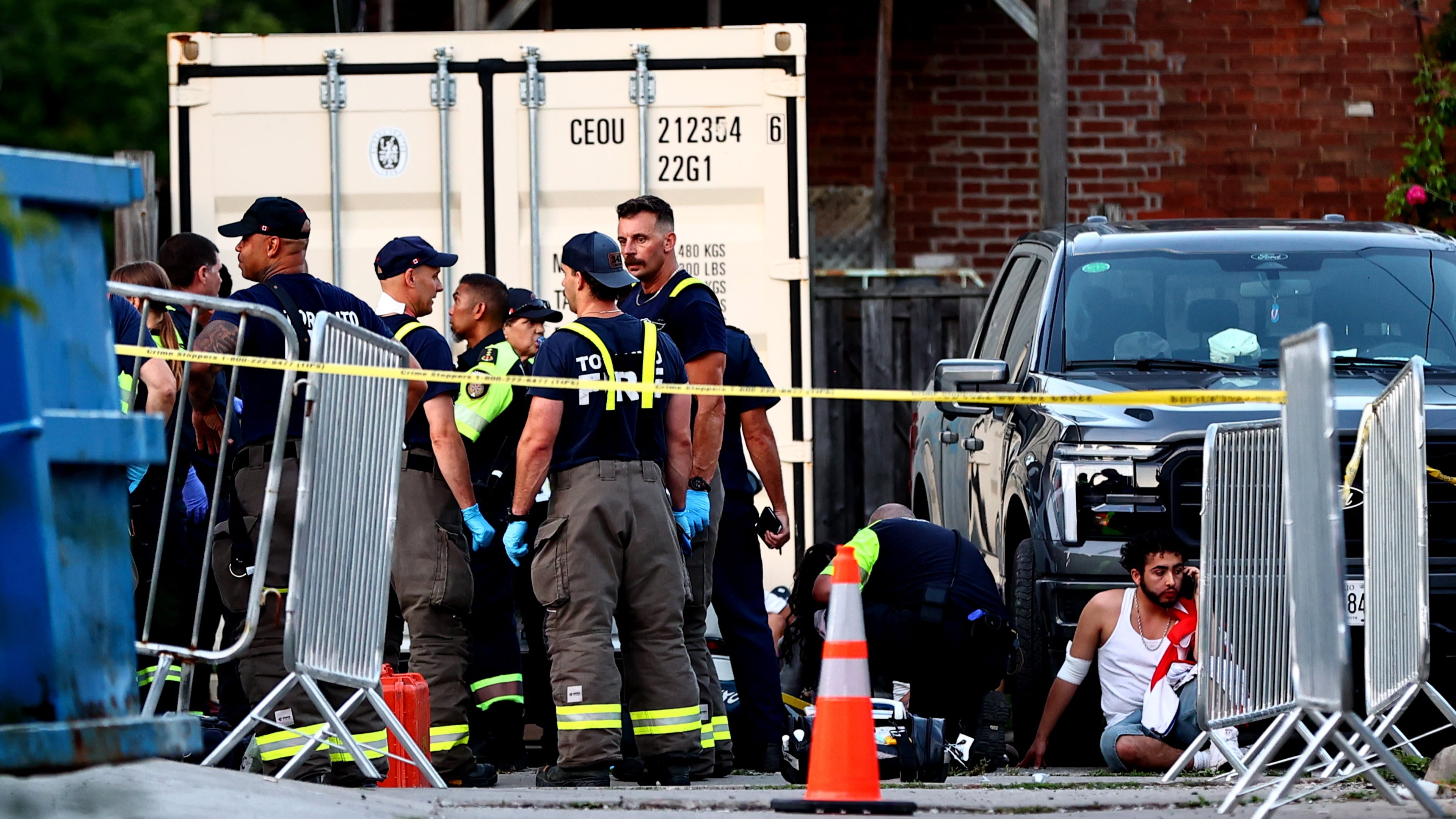 Paramedics respond to an active shooter at the Salsa on St. Clair event in Toronto, Saturday, July 11, 2026. (Keito Newman/The Canadian Press via AP)