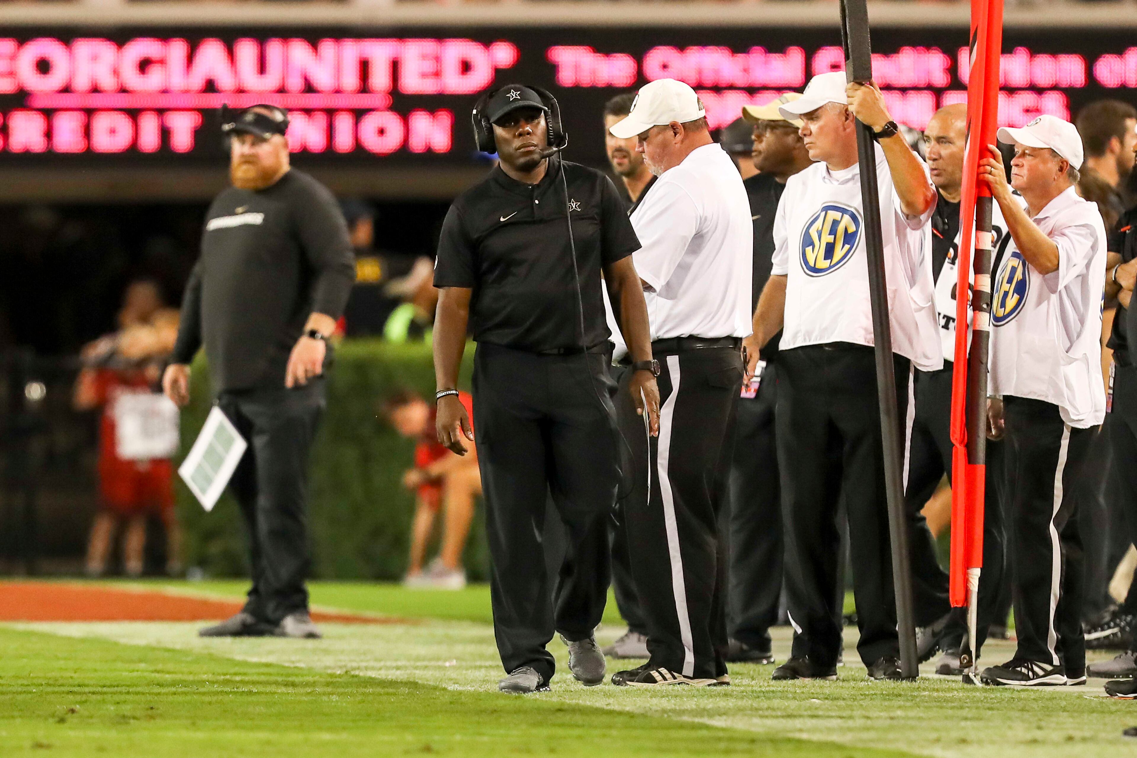 10/06/2018 -- Athens, Georgia -- Vanderbilt head coach Derek Mason walks along the sidelines during the second half of an NCAA college football game against Georgia at Sanford Stadium in Athens, Saturday, October 6, 2018. The Bulldogs beat Vanderbilt 41-13. (ALYSSA POINTER/ALYSSA.POINTER@AJC.COM)