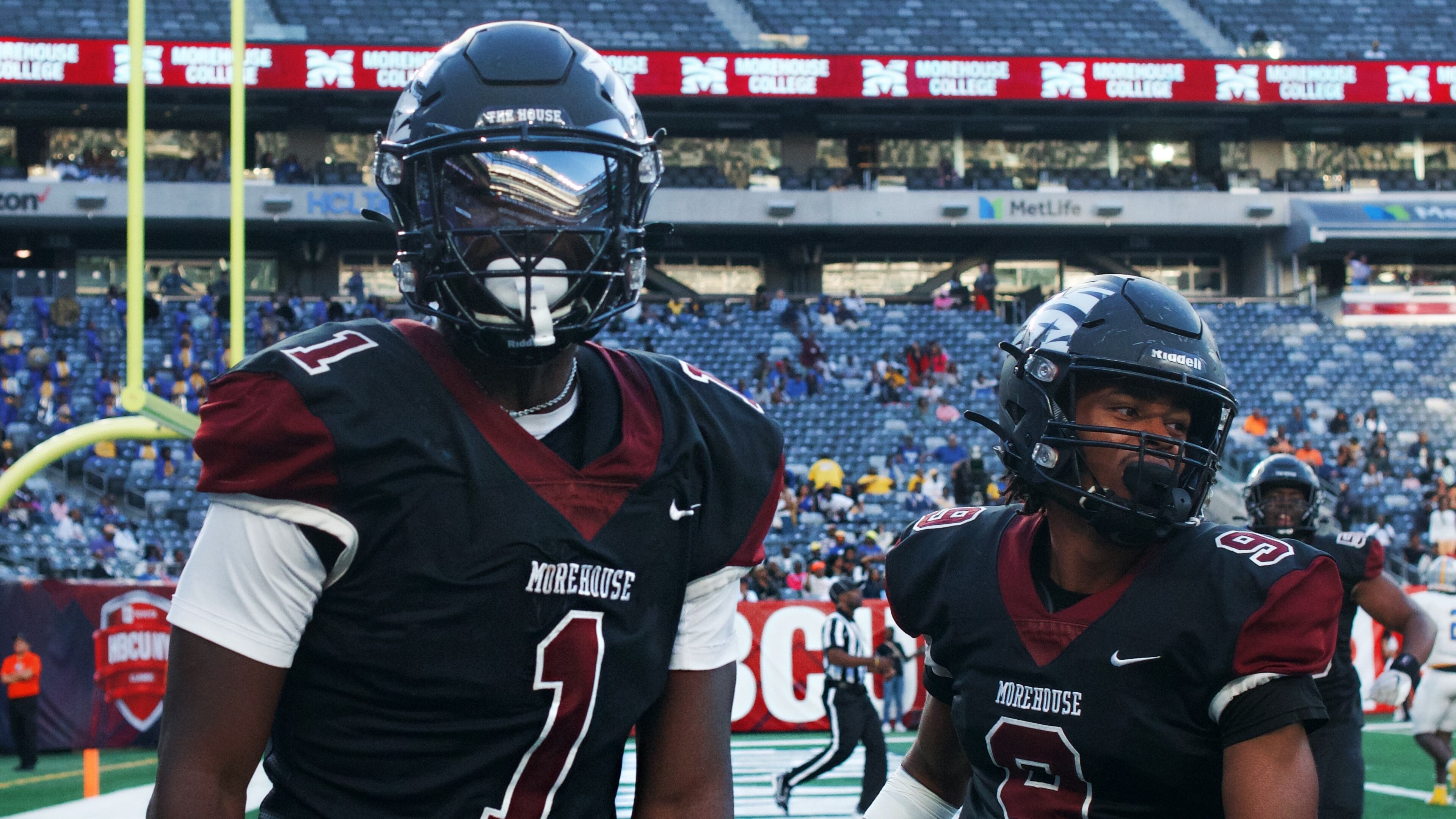 Morehouse football players Marqueiz Pride (left) and Ajani Williams on the field (Photo Courtesy of Kollin Washington)