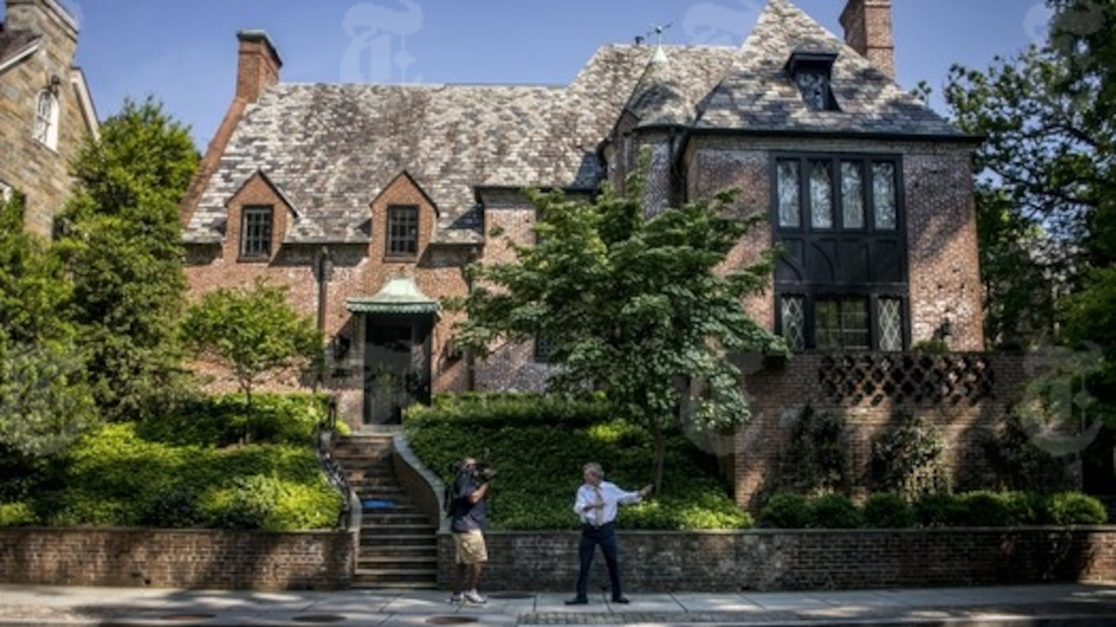 A TV crew outside the home which President Barack Obama intends to rent after leaving office, in the upscale Kalorama neighborhood of Washington, May 25, 2016. The Obamas intend to remain in the capital until Sasha graduates from high school in 2018; Just two miles from the White House, the 8,200-square-foot mansion is owned by Joe Lockhart, a former adviser to Bill Clinton who now works in New York for the NFL. (Gabriella Demczuk/The New York Times)