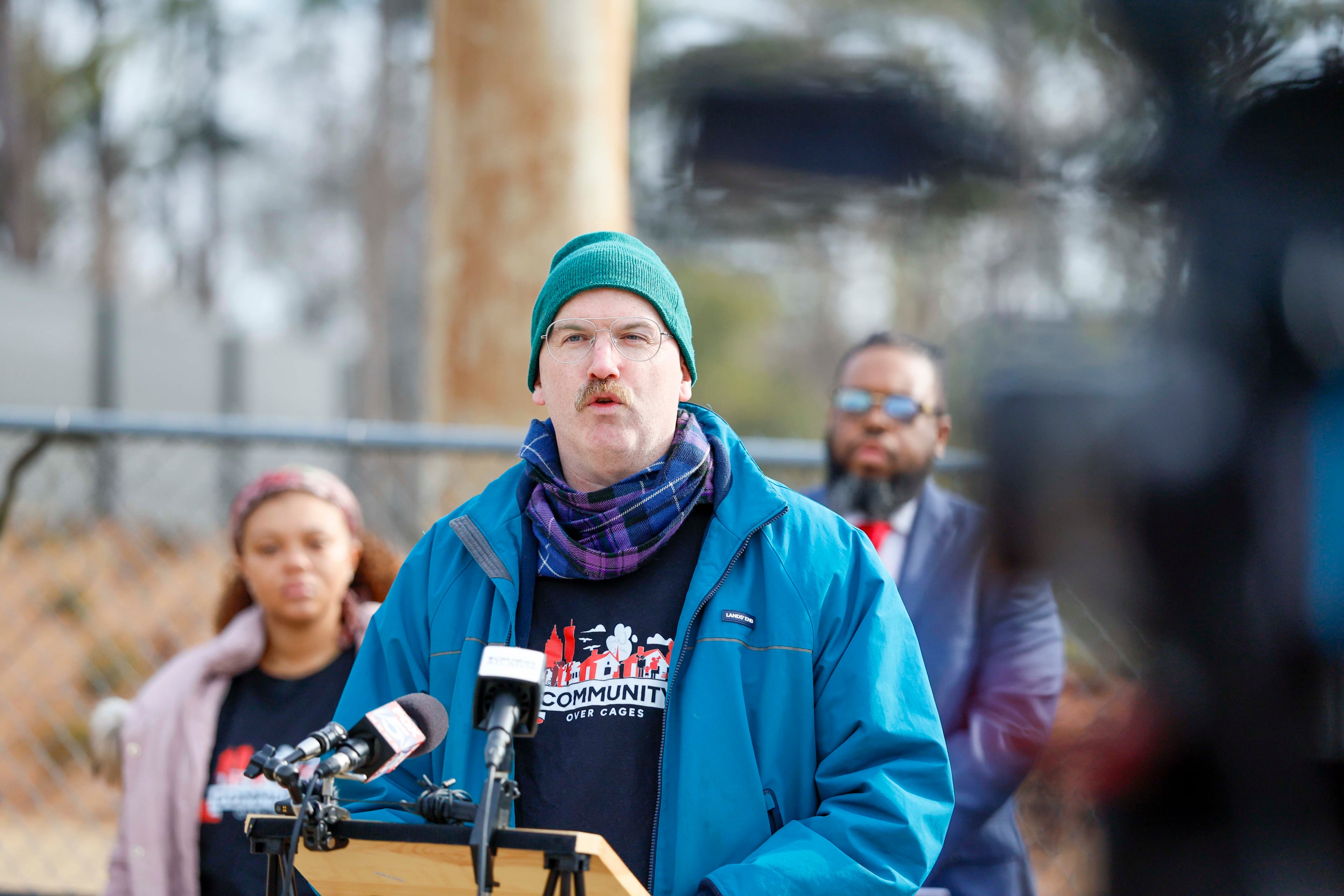 Michael Collins of Play Fair Atl speaks to press members during a news conference at the Fulton jail on Tuesday, Feb. 3, 2026. He calls the Rice Street jail “a death trap” and “an unconstitutional hellhole.” (Miguel Martinez/AJC)