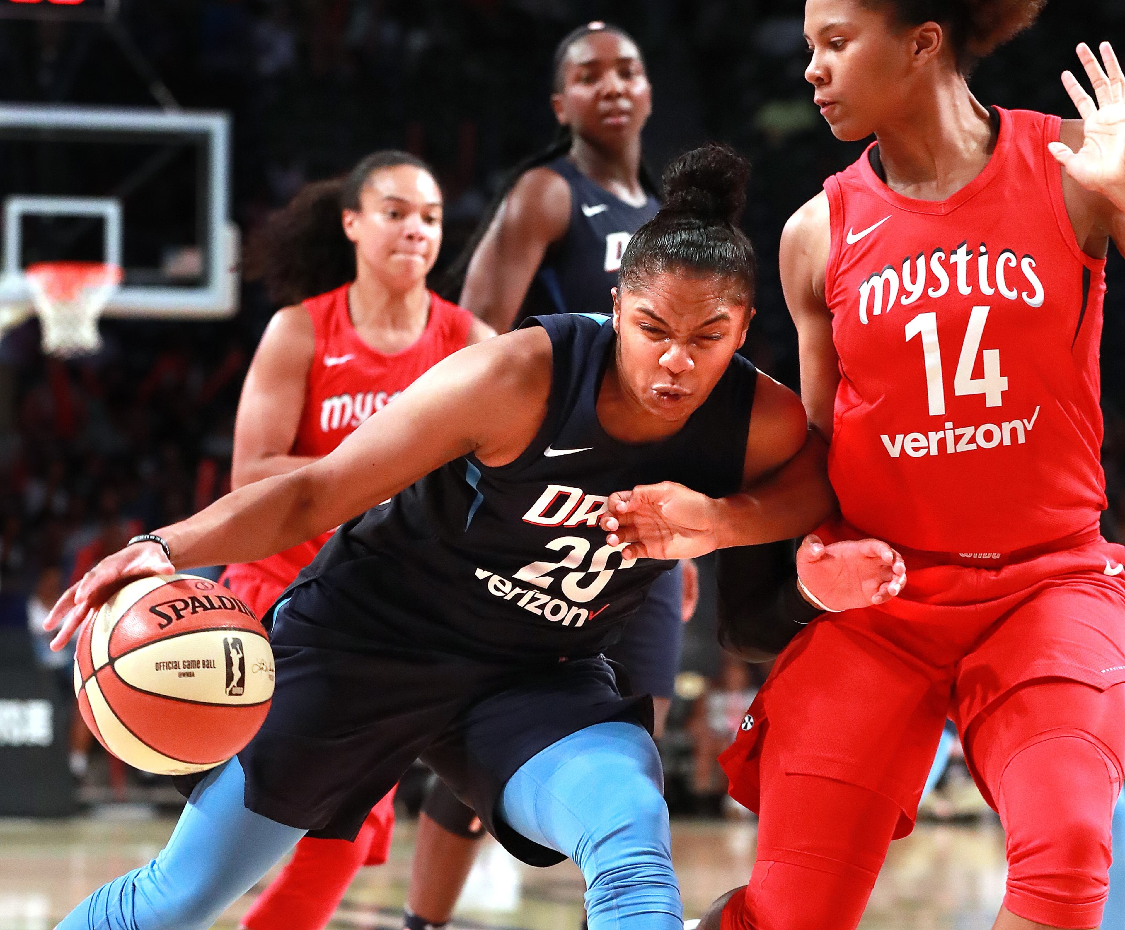 August 26, 2018 Atlanta: Atlanta Dream guard Alex Bentley collides with Washington Mystics defender Tierra Ruffin-Pratt while trying to drive to the basket during the first half in a WNBA semifinal playoff game on Sunday, August 26, 2018, in Atlanta. Curtis Compton/ccompton@ajc.com