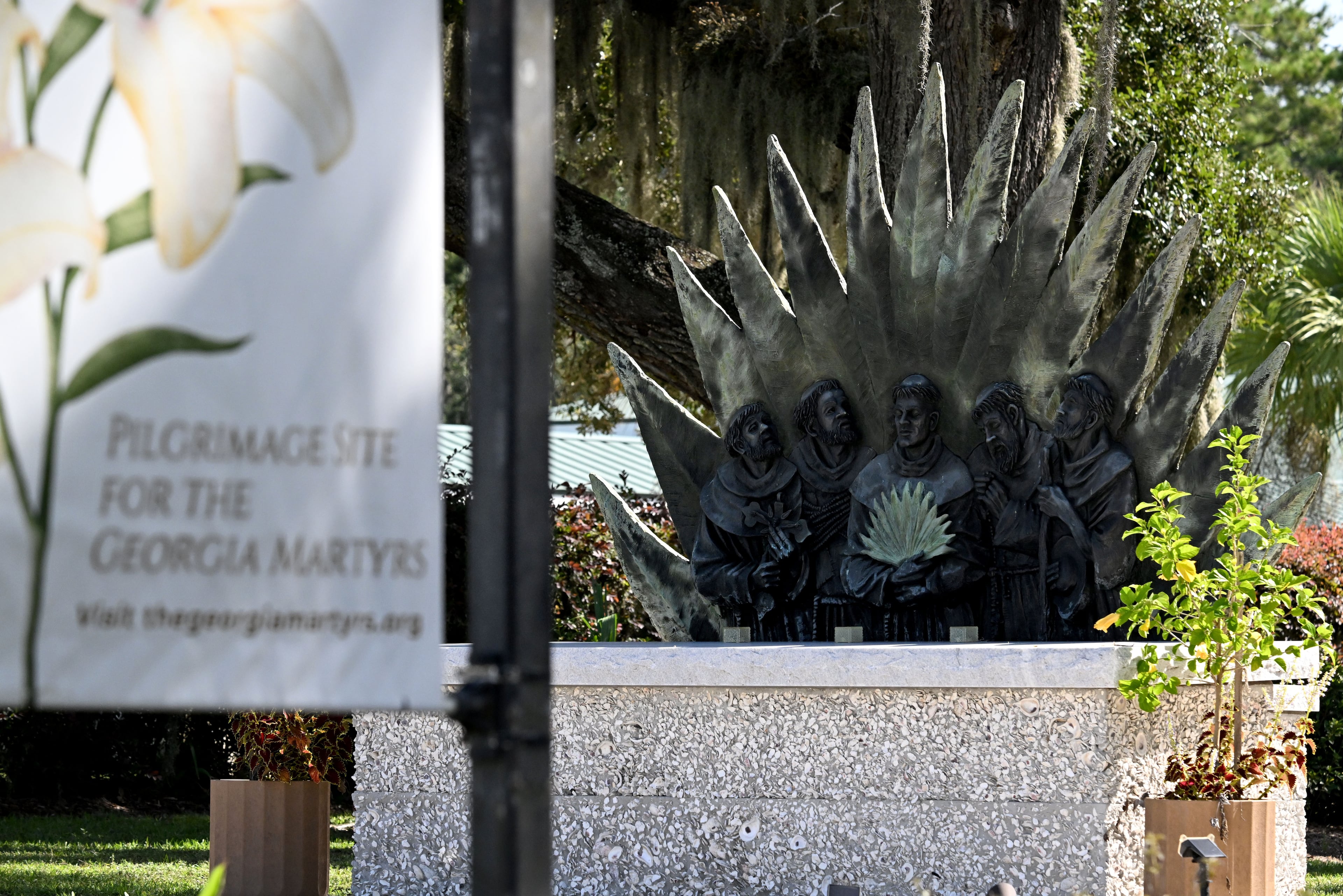 A sculpture of the Georgia Martyrs, five friars whose cause for canonization has been championed by the Franciscan Order and the Diocese of Savannah for the past 40 years, stands outside Nativity of Our Lady Catholic Church on Wednesday, Sept. 16, 2026, in Darien. (Hyosub Shin/AJC)