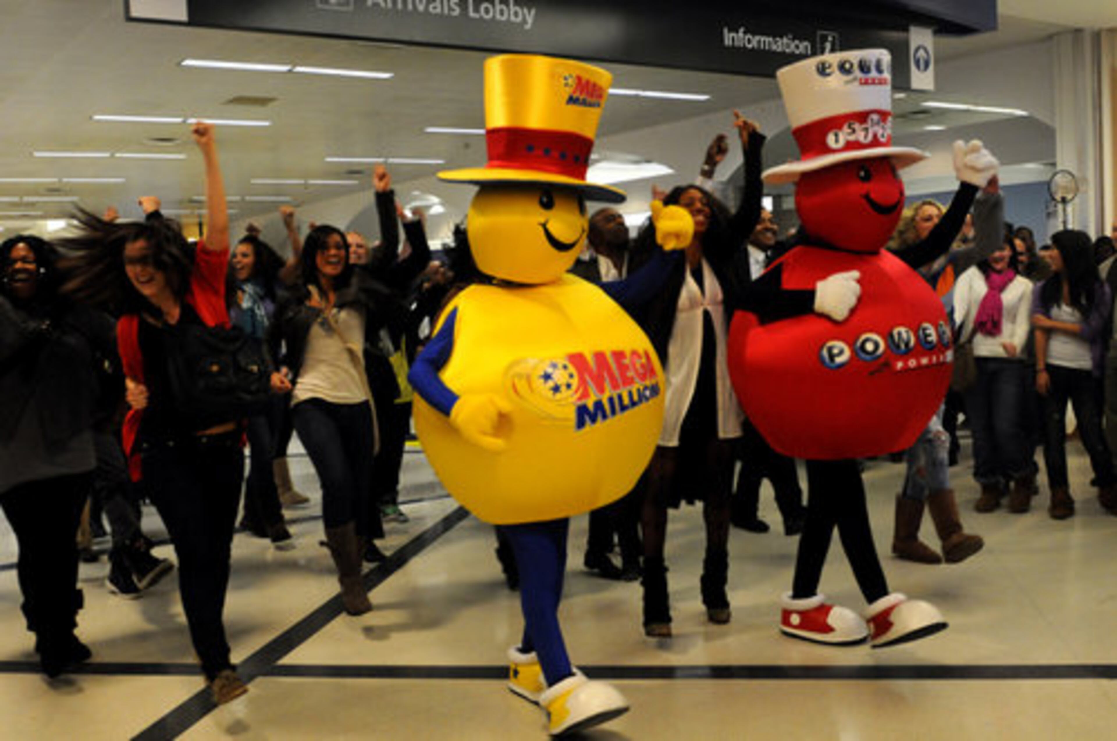 This is not one of my favorite photos and I probably would never include it in my portfolio but I love this photo because it was the first time I saw a flash mob and it was at the busiest airport in the world--pretty cool. From left, Megaball and the new Powerball dance with an estimated 100 people at Atlanta Hartsfield-Jackson International Airport Tuesday, Feb 2, 2010. The flash mob is designed to promote the new Powerball drawing coming to Atlanta.