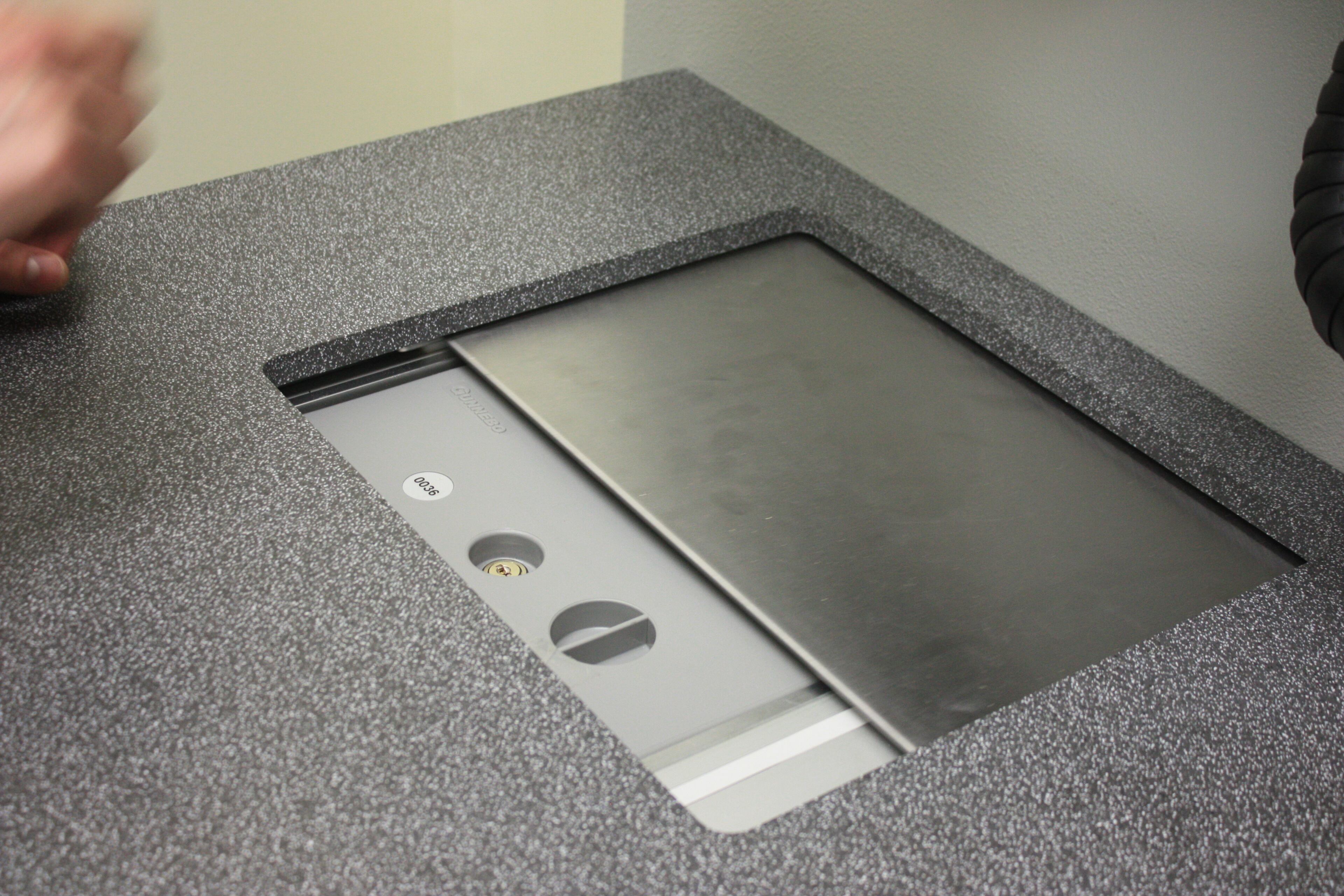 The sliding door closes again and the automated system returns the box to the vault, which holds 101 boxes.