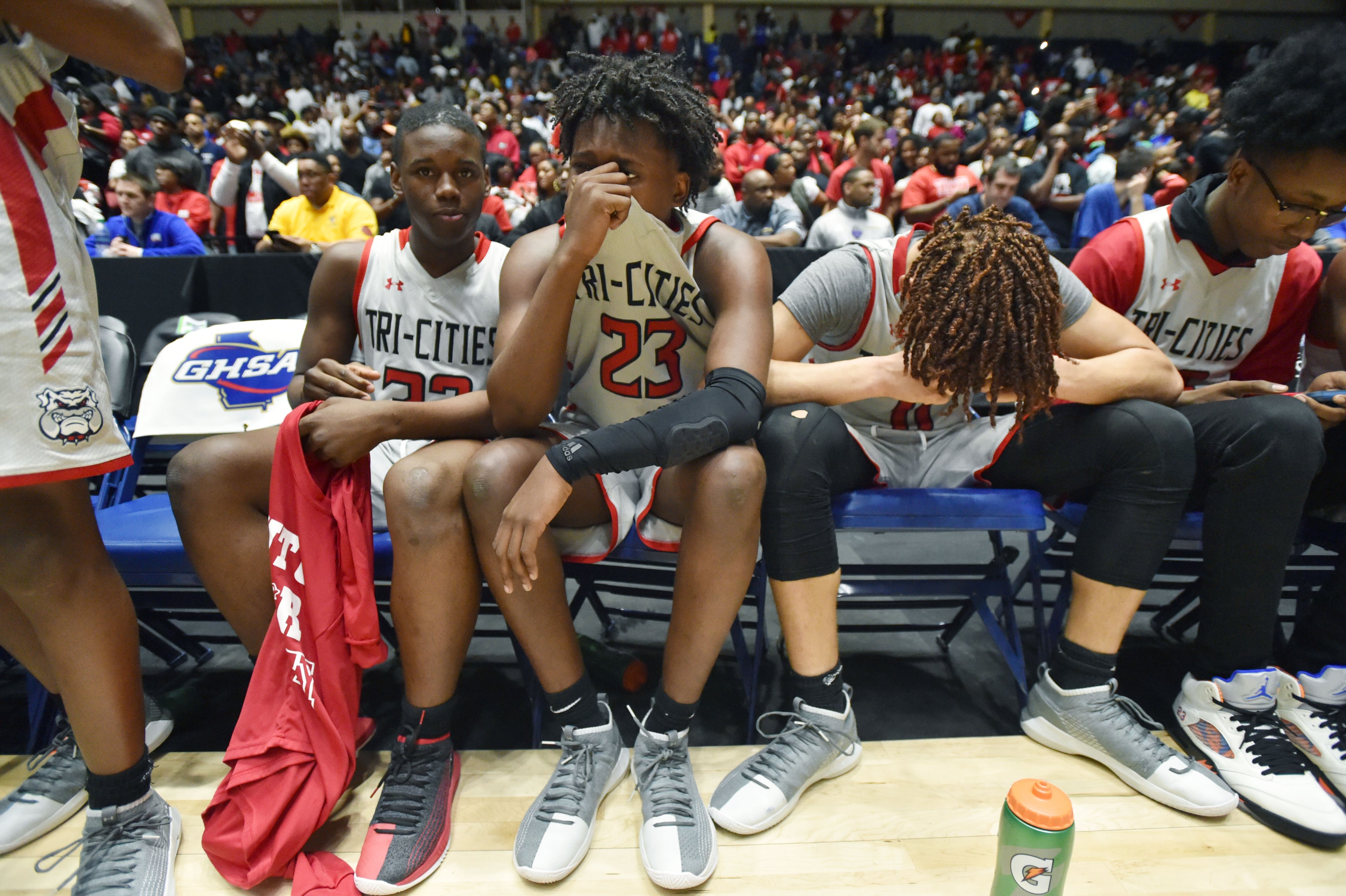 March 9, 2019 Macon - Tri-Cities Davon Cottle (23) can't hide emotion after the team won in GHSA State Basketball Championship game at the Macon Centreplex in Macon on Saturday, March 9, 2019. Tri-Cities won 46-43 over the Tucker. HYOSUB SHIN / HSHIN@AJC.COM