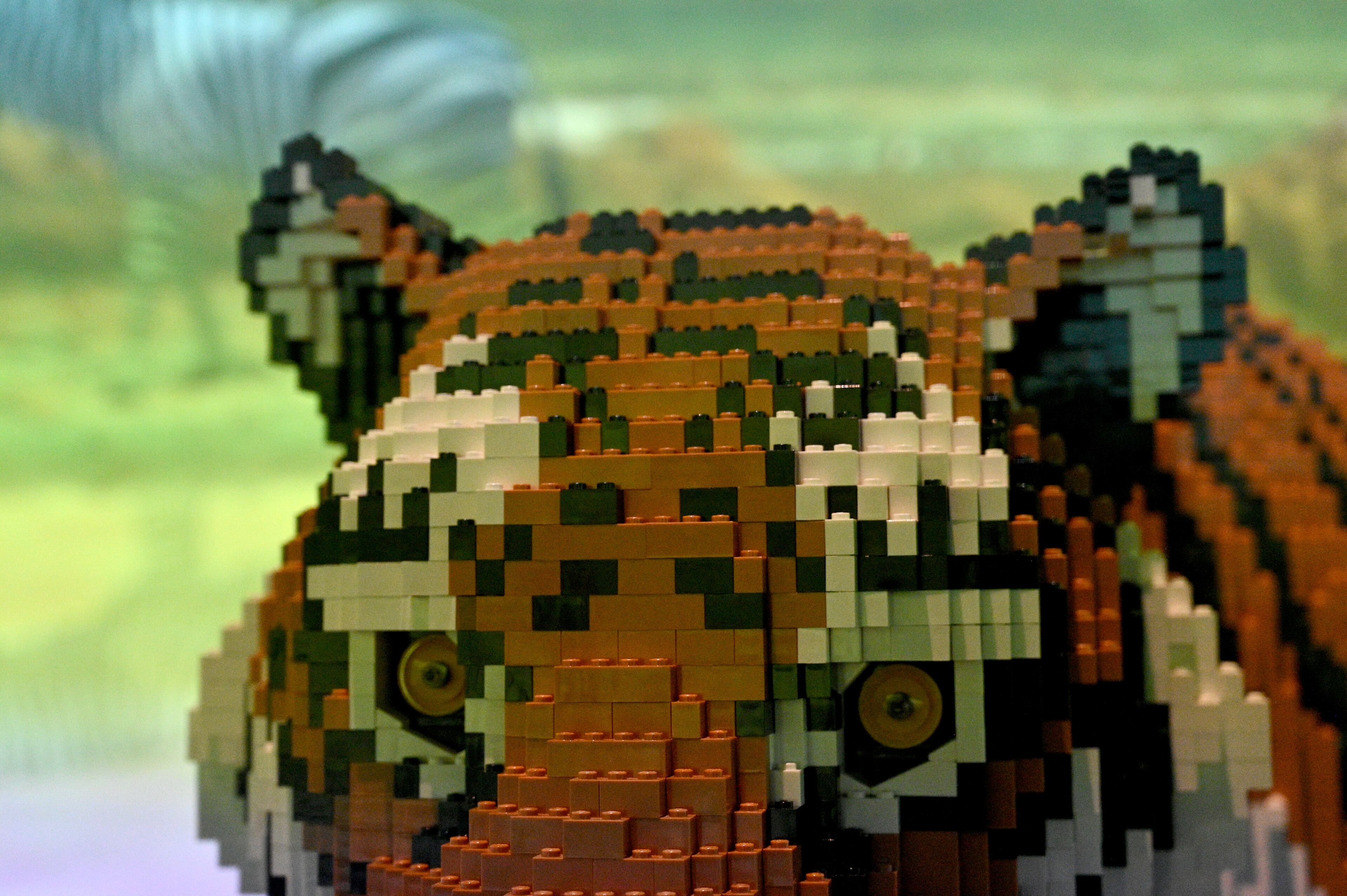 “Malayan Tiger” made with 20,530 Lego bricks in “Perniciem” room at "Art of the Brick Immersive Experience" exhibition at Exhibition Hub Atlanta Art Centre, Wednesday, April 19, 2023, in Doraville. The exhibition will feature many pieces and themes, including a room with oversized sculptures (25-foot long), over 70 works of art crafted from more than 1 million LEGO bricks, galleries celebrating human-kind and nature, and a short documentary about how Nathan creates his works. (Hyosub Shin / Hyosub.Shin@ajc.com)