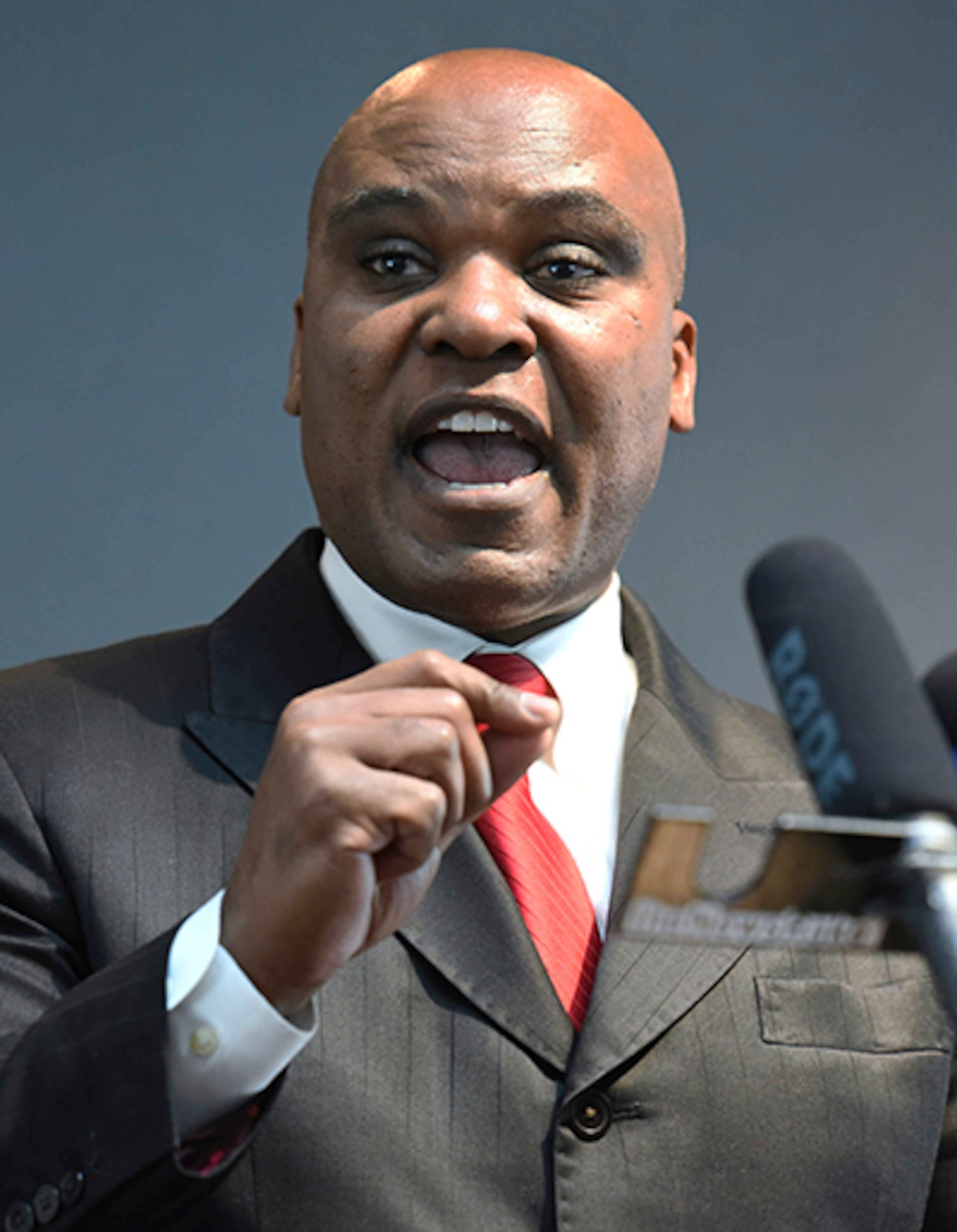 Attorney Cannon Lambert talks Nov. 5 about some changes he would like to see Buffalo Wild Wings make after a group of customers said they were mistreated.