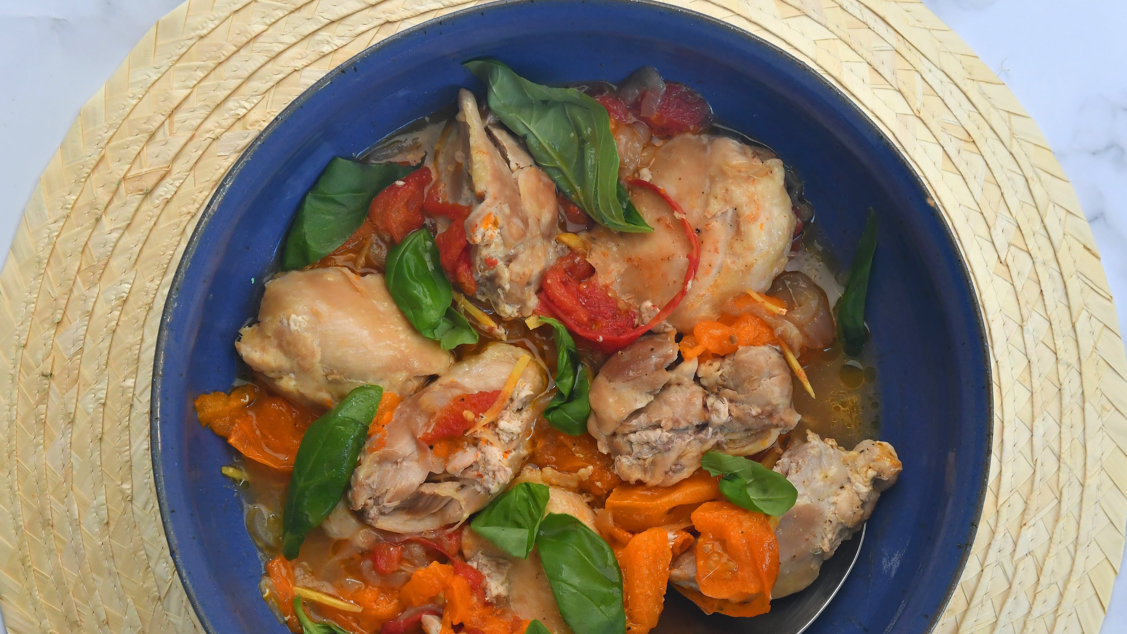 Tomato-Braised Chicken Thighs.
(CHRIS HUNT FOR THE ATLANTA JOURNAL-CONSTITUTION)