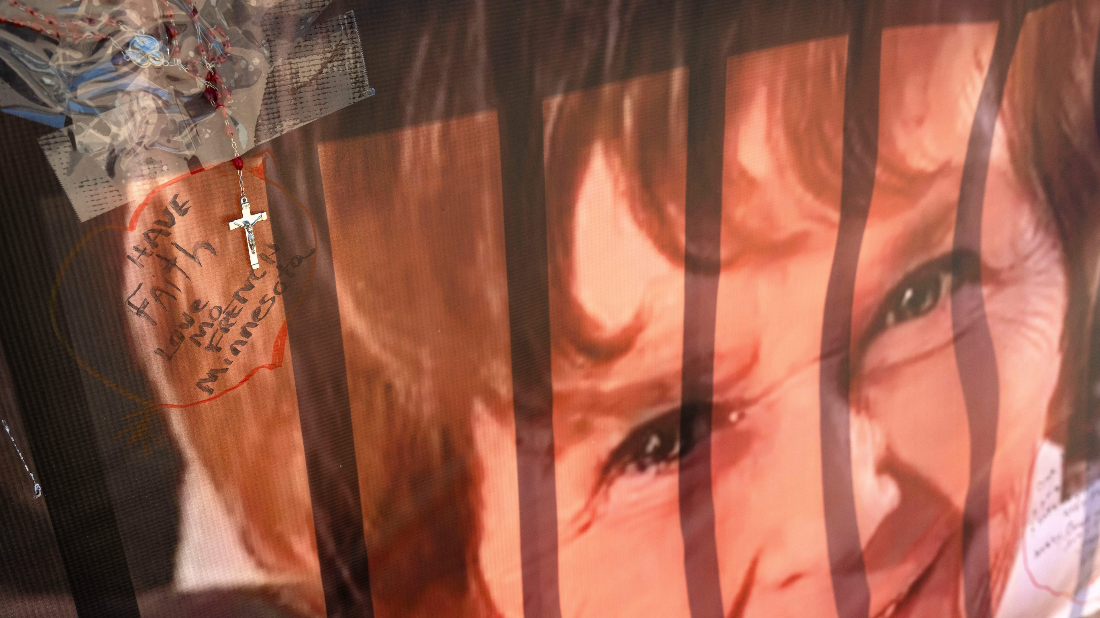 FILE - A banner with notes from hundreds of well-wishers for Nancy Guthrie, the missing mother of "Today" show host Savannah Guthrie, is displayed outside of KVOA Newsroom on March 6, 2026, in Tucson, Ariz. (AP Photo/Rebecca Noble, File)