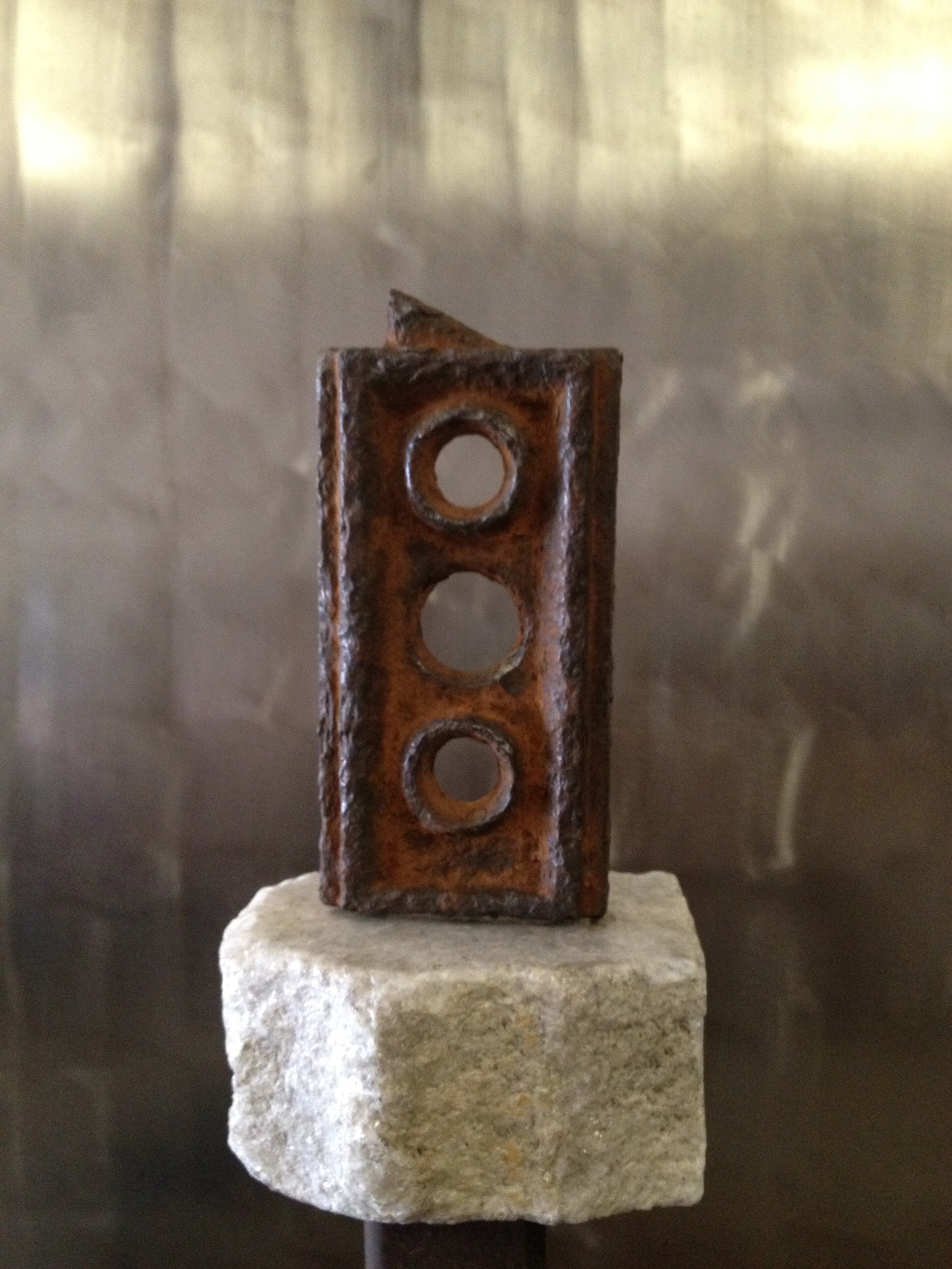 Local sculptor and metal artist Thomas Prochnow creates small pieces specifically for the Swan Coach House's "Little Things Mean a Lot" holiday exhibition. They are made from found objects he comes across on his own property and affixed to marble. See Pronchow's work at Swan Coach House Gallery in Atlanta Tuesdays-Saturdays through Jan. 2. Photo credit: Thomas Prochnow