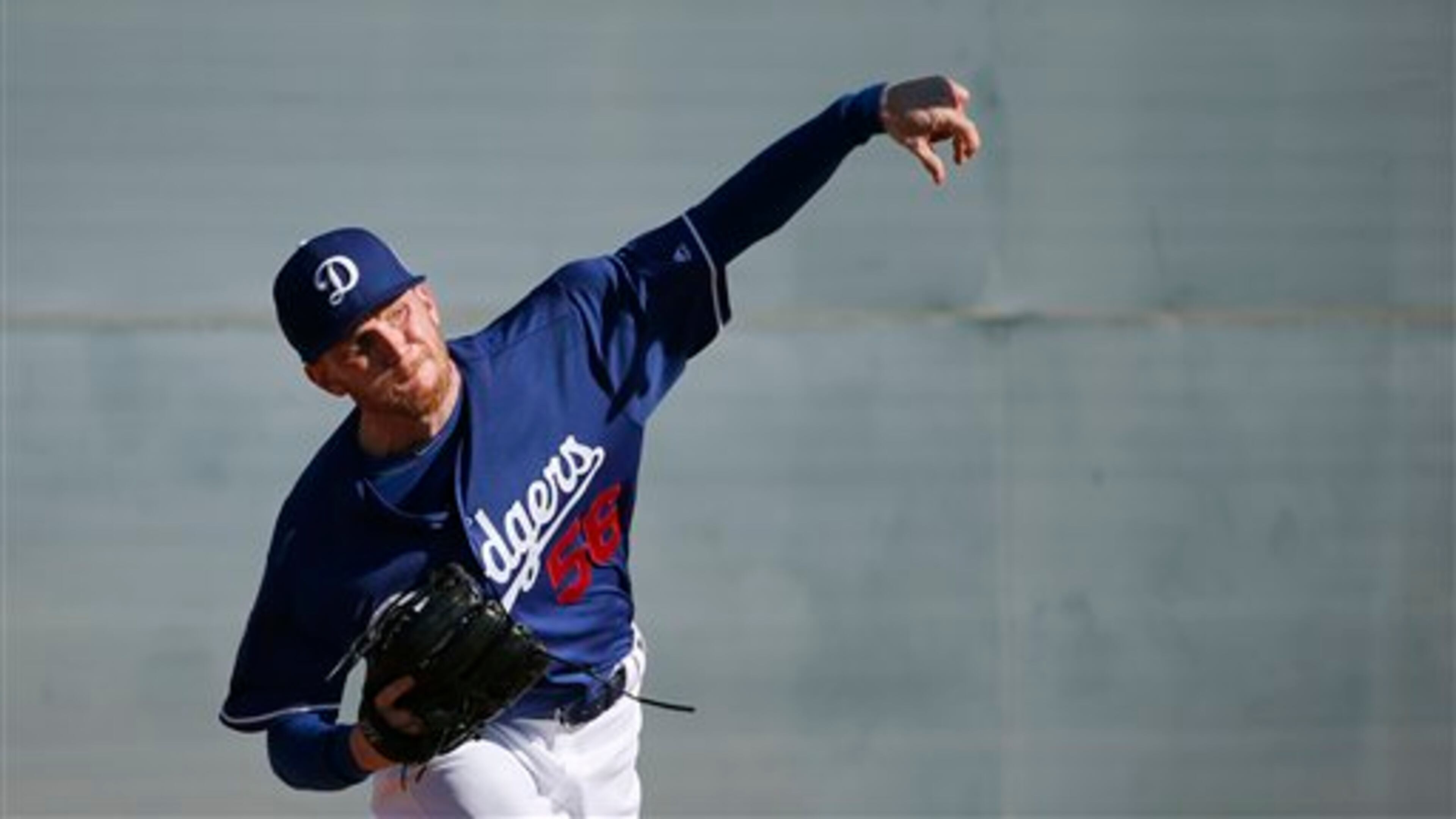 Los Angeles Dodgers' J.P. Howell throws a pitch during a spring training baseball workout Monday, Feb. 22, 2016, in Glendale, Ariz. (AP Photo/Ross D. Franklin)