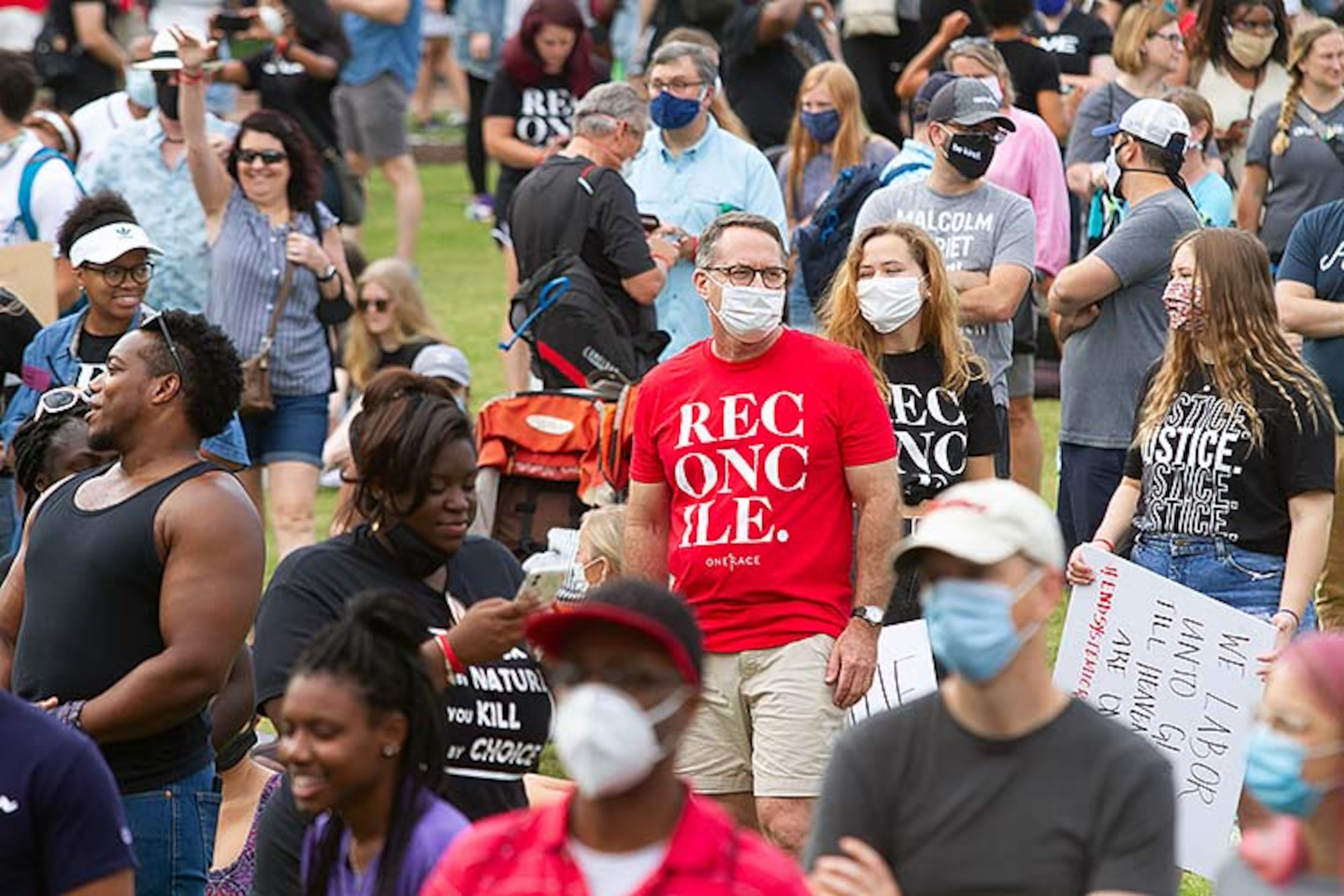 A large crowd gathers at the Centennial Olympic Park stage for an OneRace prayer and worship before marching to the State capital Friday, June 19, 2020. STEVE SCHAEFER FOR THE ATLANTA JOURNAL-CONSTITUTION