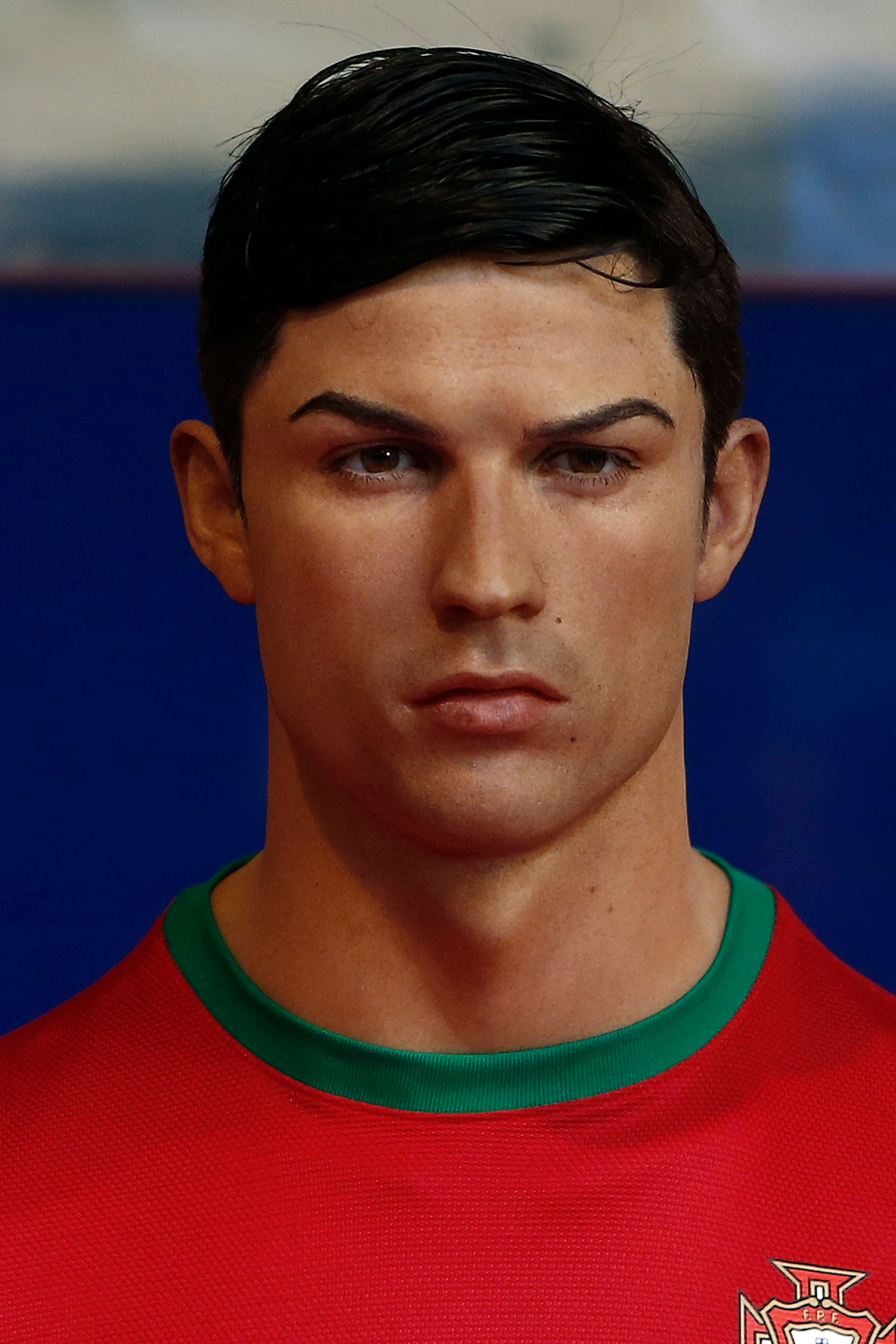 Real Madrid's Cristiano Ronaldo's wax figure is presented at the Wax Museum in Madrid, Spain, Saturday, Dec. 7, 2013. (AP Photo/Andres Kudacki)