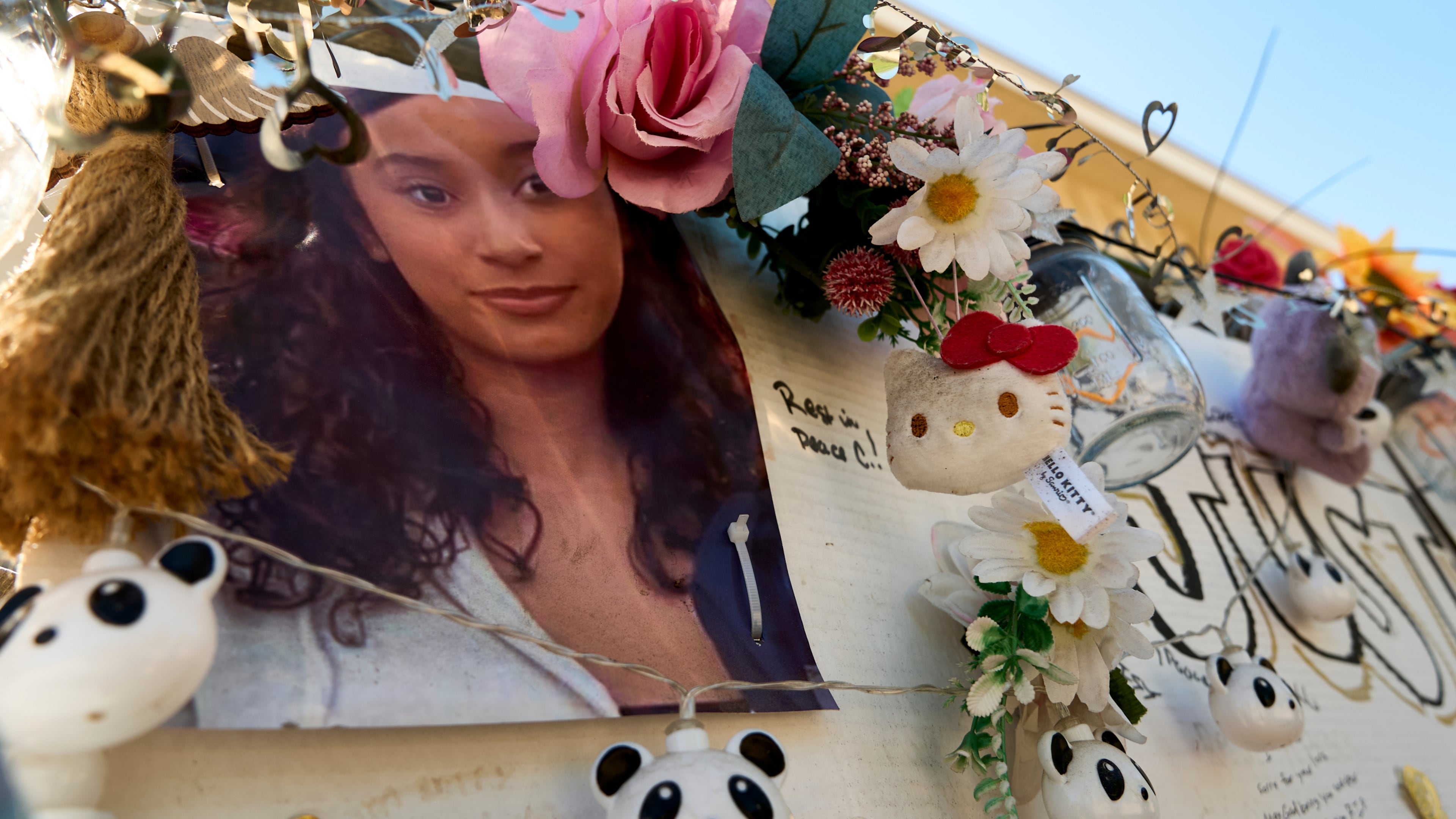 FILE - A makeshift memorial for Celeste Rivas Hernandez, whose body was found inside a vehicle owned by singer D4vd, is displayed outside her home in Lake Elsinore, Calif., on April 21, 2026. (AP Photo/Damian Dovarganes, File)