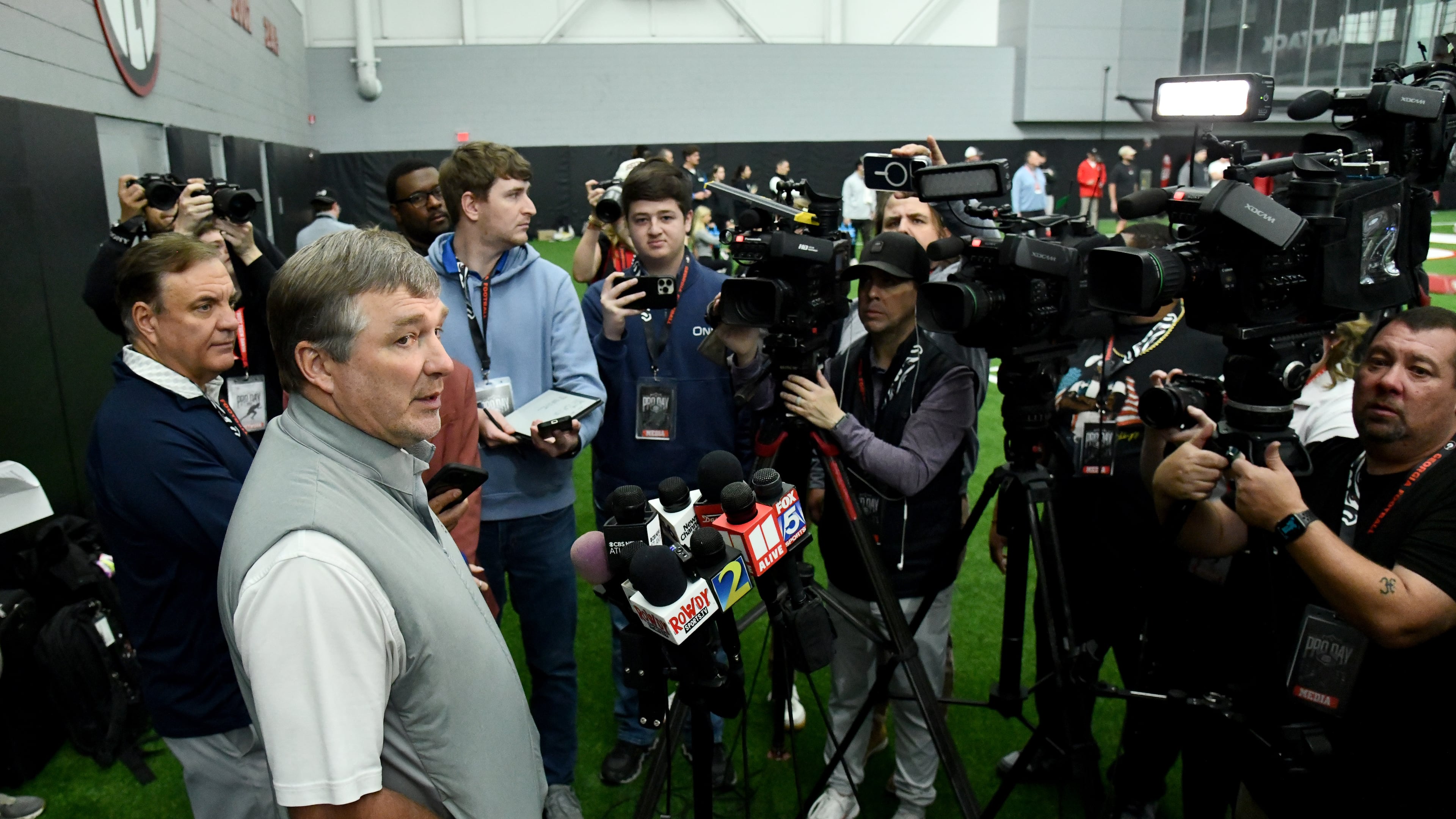 Georgia head coach Kirby Smart (shown here speaking to the press during Georgia's NFL Pro Day at Payne Indoor Athletic Facility in Athens, Wednesday, March 18, 2026) favors a proposed five-year eligibility window. (Hyosub Shin/AJC)