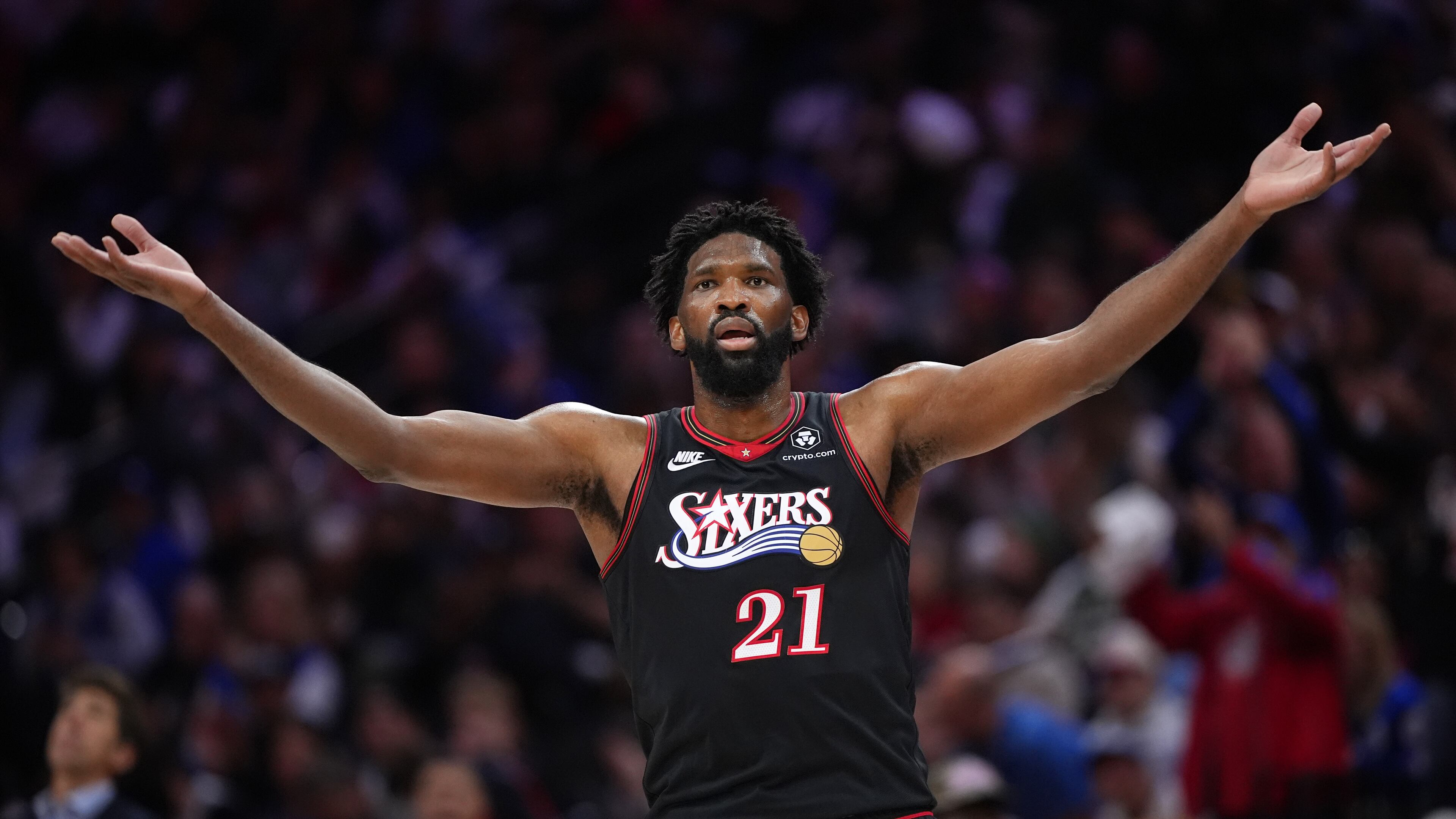 Philadelphia 76ers' Joel Embiid reacts during the first half of Game 4 against the Boston Celtics in a first-round NBA basketball playoffs series Sunday, April 26, 2026, in Philadelphia. (AP Photo/Matt Slocum)