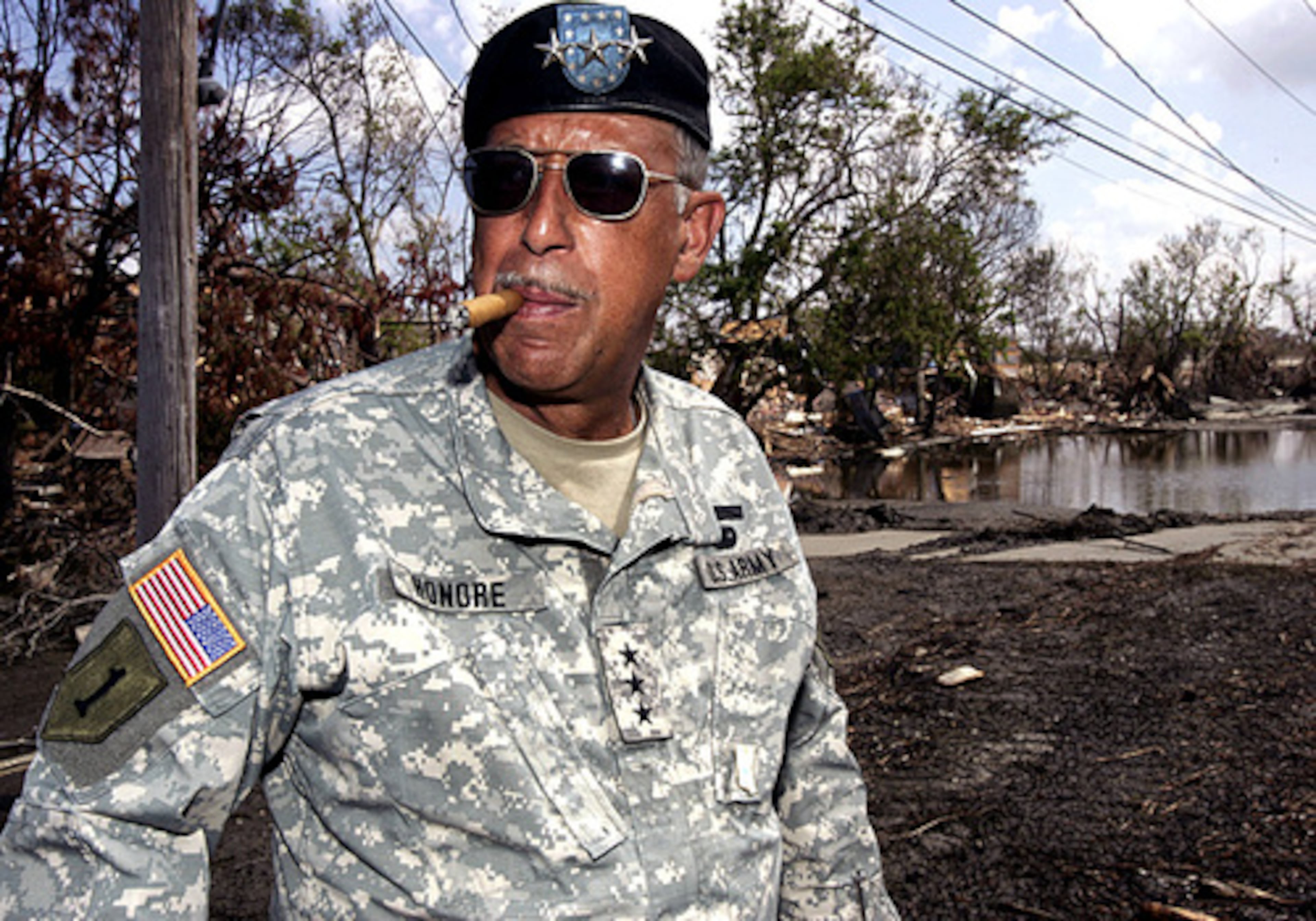 October 2005: Honore looks over the extensive flood damage by Hurricanes Katrina and Rita in the town of Empire in Plaquemines Parish, La., as he tours the area just over a month after Hurricane Katrina and a week after Rita.
