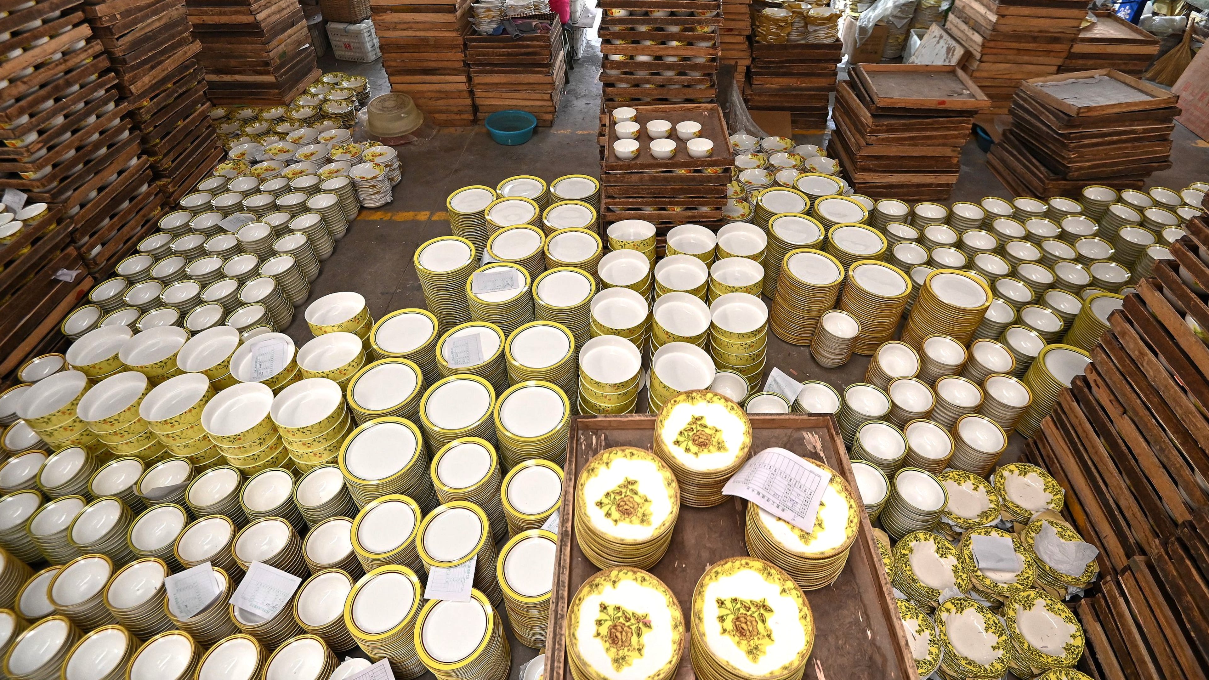 FILE - Workers labor at a ceramic ware factory, in Handan in north China's Hebei province on Nov. 4, 2025. (Chinatopix Via AP, File)
