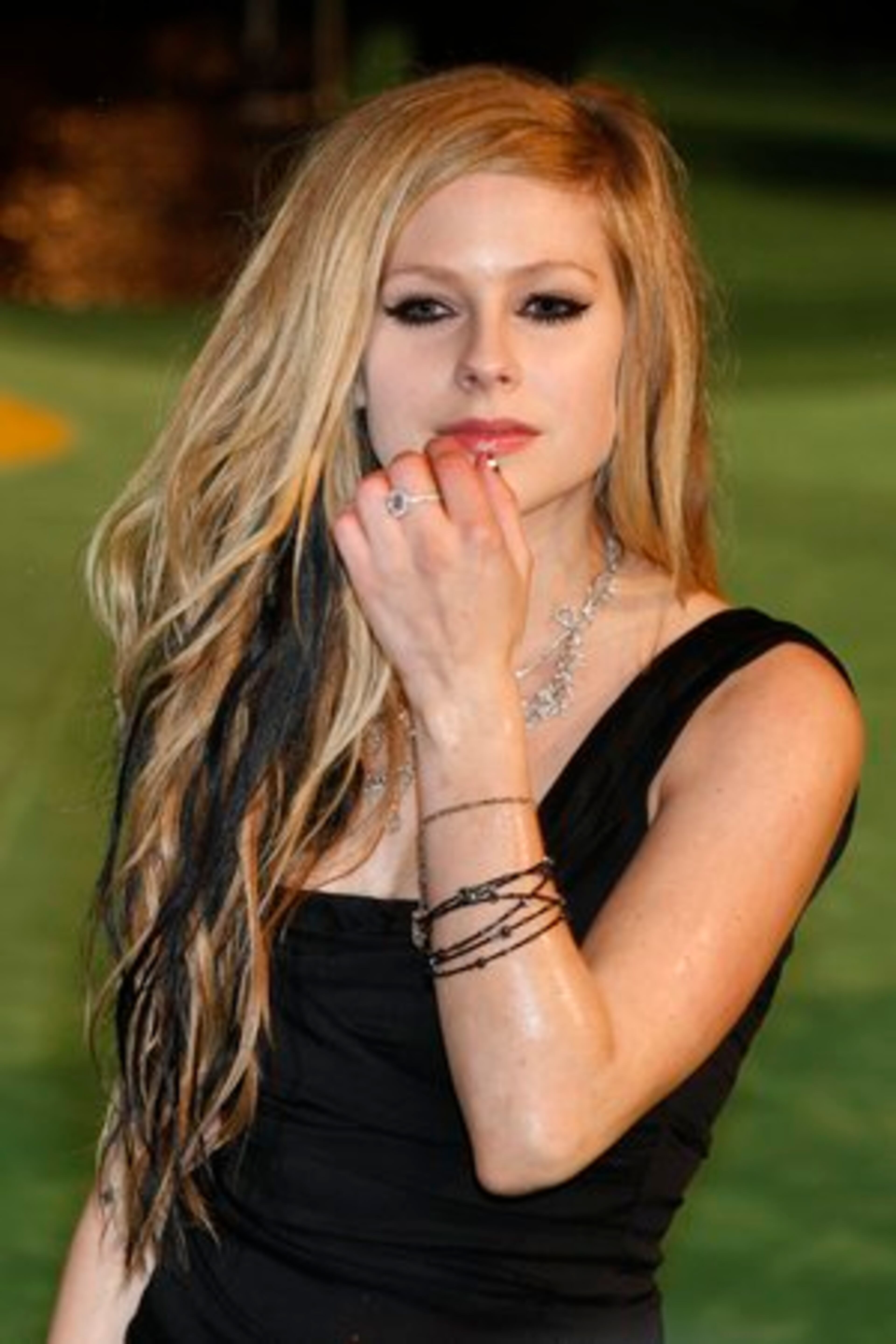 Canadian singer Avril Lavigne arrives.