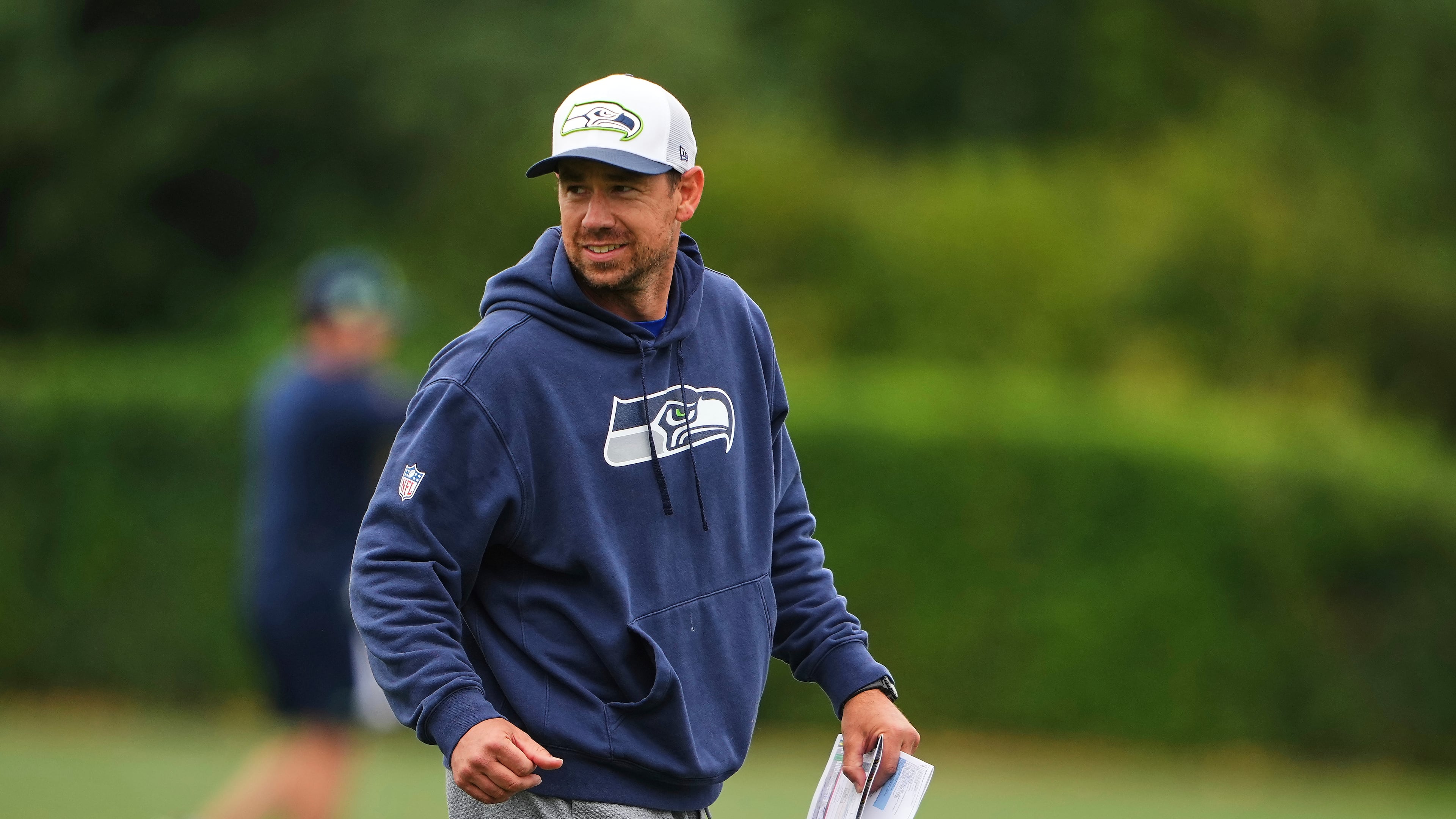 FILE - Seattle Seahawks offensive coordinator Klint Kubiak walks on the field during the NFL football team's training camp July 26, 2025, in Renton, Wash. (AP Photo/Lindsey Wasson, File)