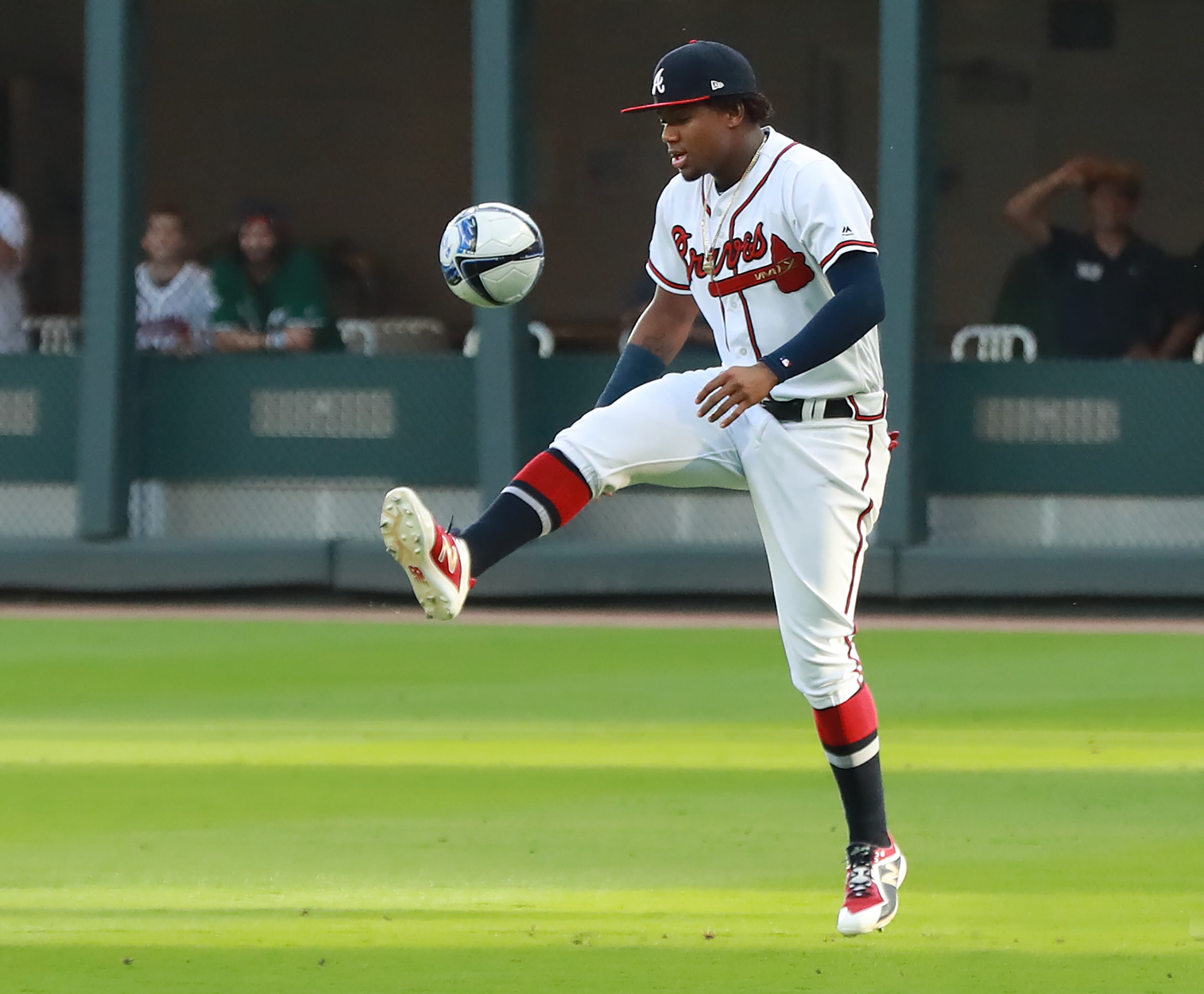 Braves' Ronald Acuna Jr. kicks around a soccer ball in the outfield while the team recognizes the Atlanta United team for winning the MLS Cup before playing the Arizona Diamondbacks in a MLB baseball game on Wednesday, April 17, 2019, in Atlanta. Curtis Compton/ccompton@ajc.com