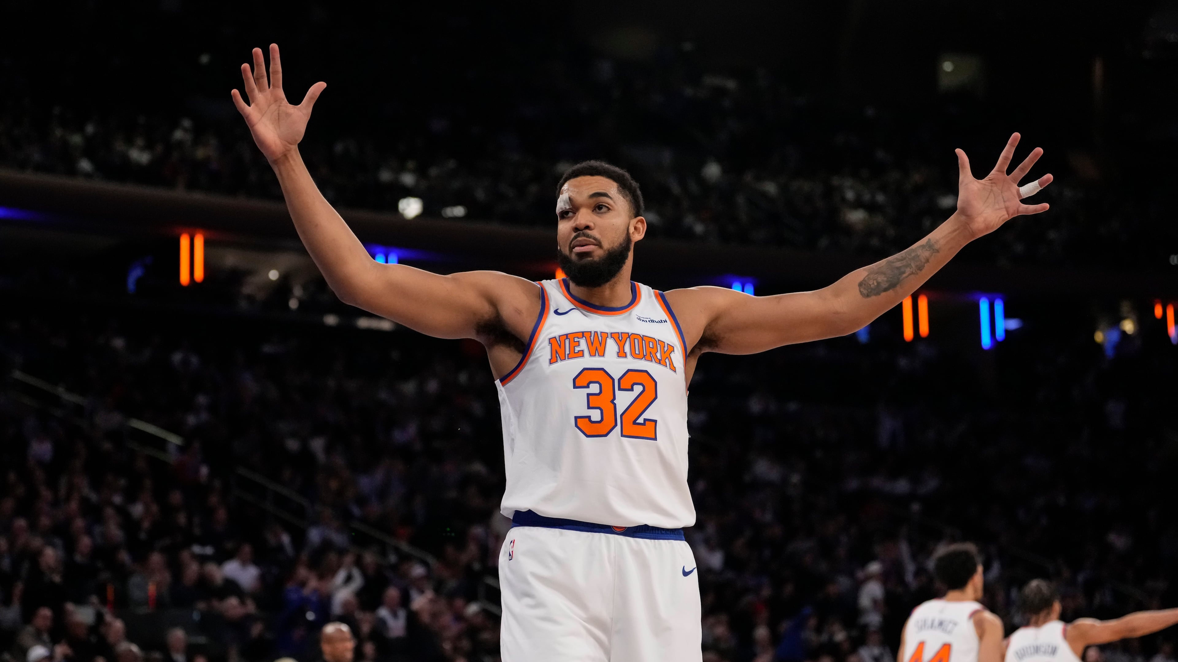 New York Knicks center Karl-Anthony Towns (32) reacts during the first half of an NBA basketball game against the Denver Nuggets, Wednesday, Feb. 4, 2026, in New York. (AP Photo/Yuki Iwamura)
