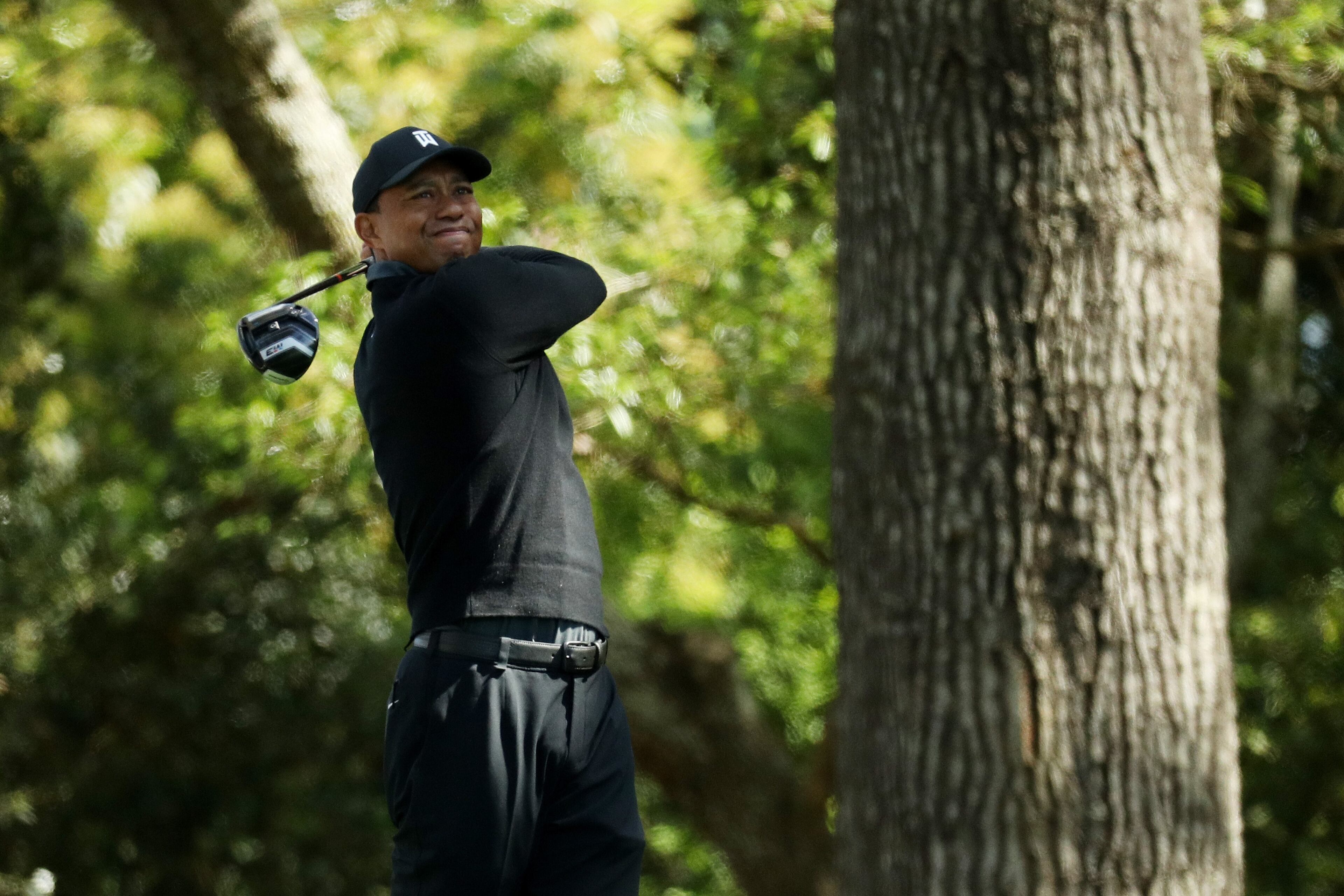 AUGUSTA, GA - APRIL 05: Tiger Woods of the United States plays his shot from the second tee during the first round of the 2018 Masters Tournament at Augusta National Golf Club on April 5, 2018 in Augusta, Georgia. (Photo by Patrick Smith/Getty Images)