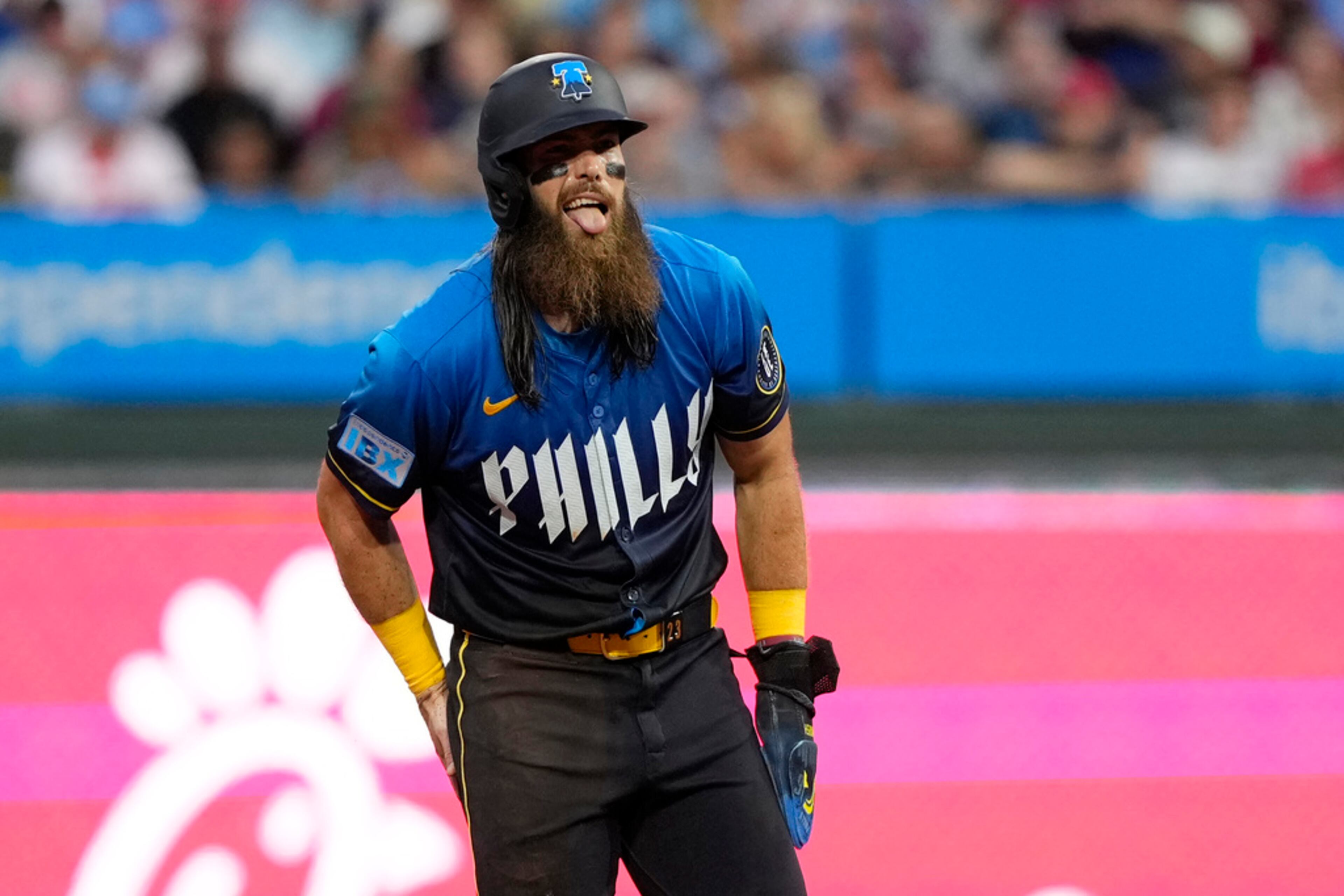 Philadelphia Phillies' Brandon Marsh reacts after stealing second base during the second inning of a baseball game against the Atlanta Braves, Friday, Aug. 30, 2024, in Philadelphia. (AP Photo/Matt Slocum)