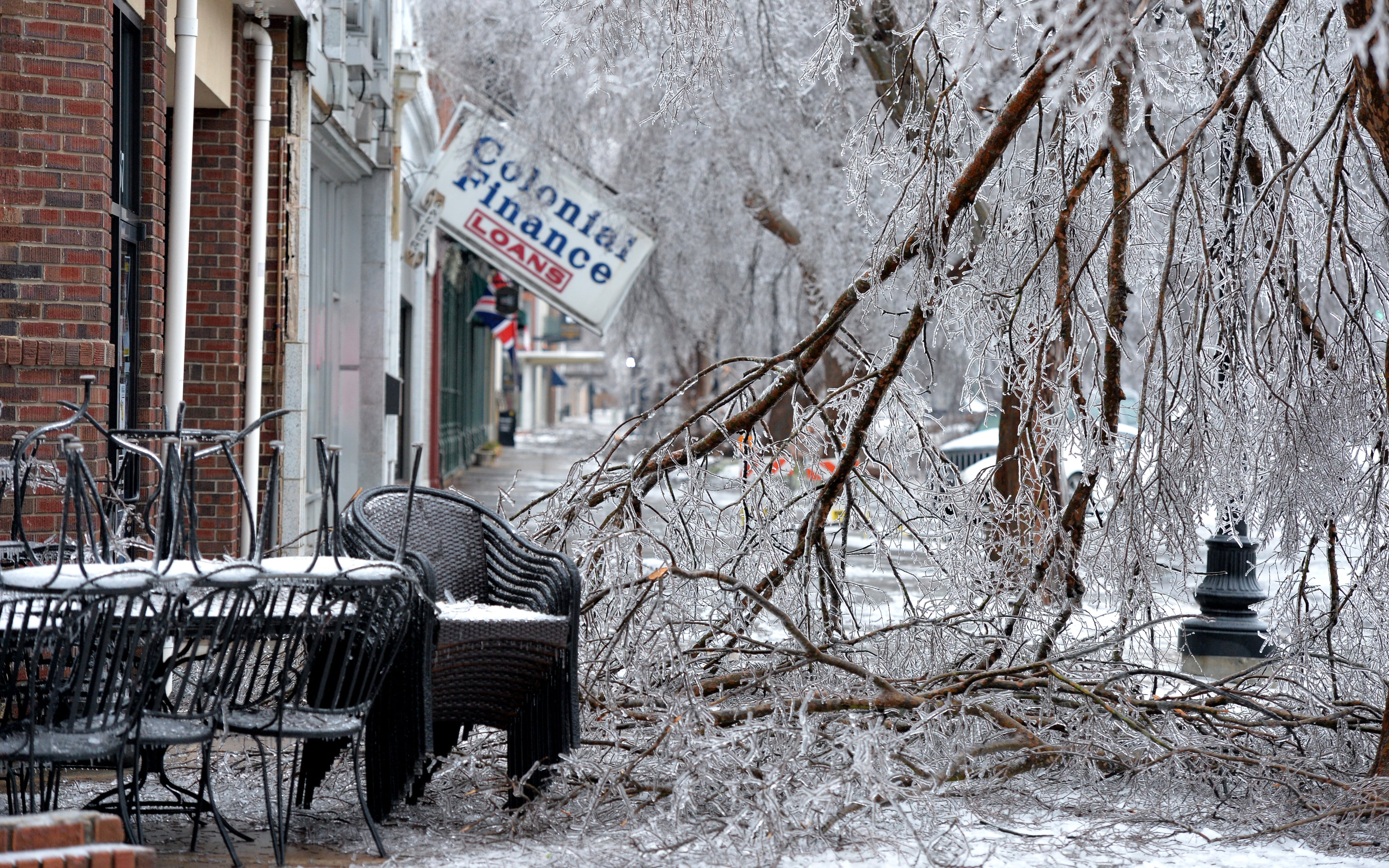 The ice storm caused many trees to break under heavy limbs on Broad Street in downtown Augusta on Thursday, February 13, 2014. HYOSUB SHIN / HSHIN@AJC.COM