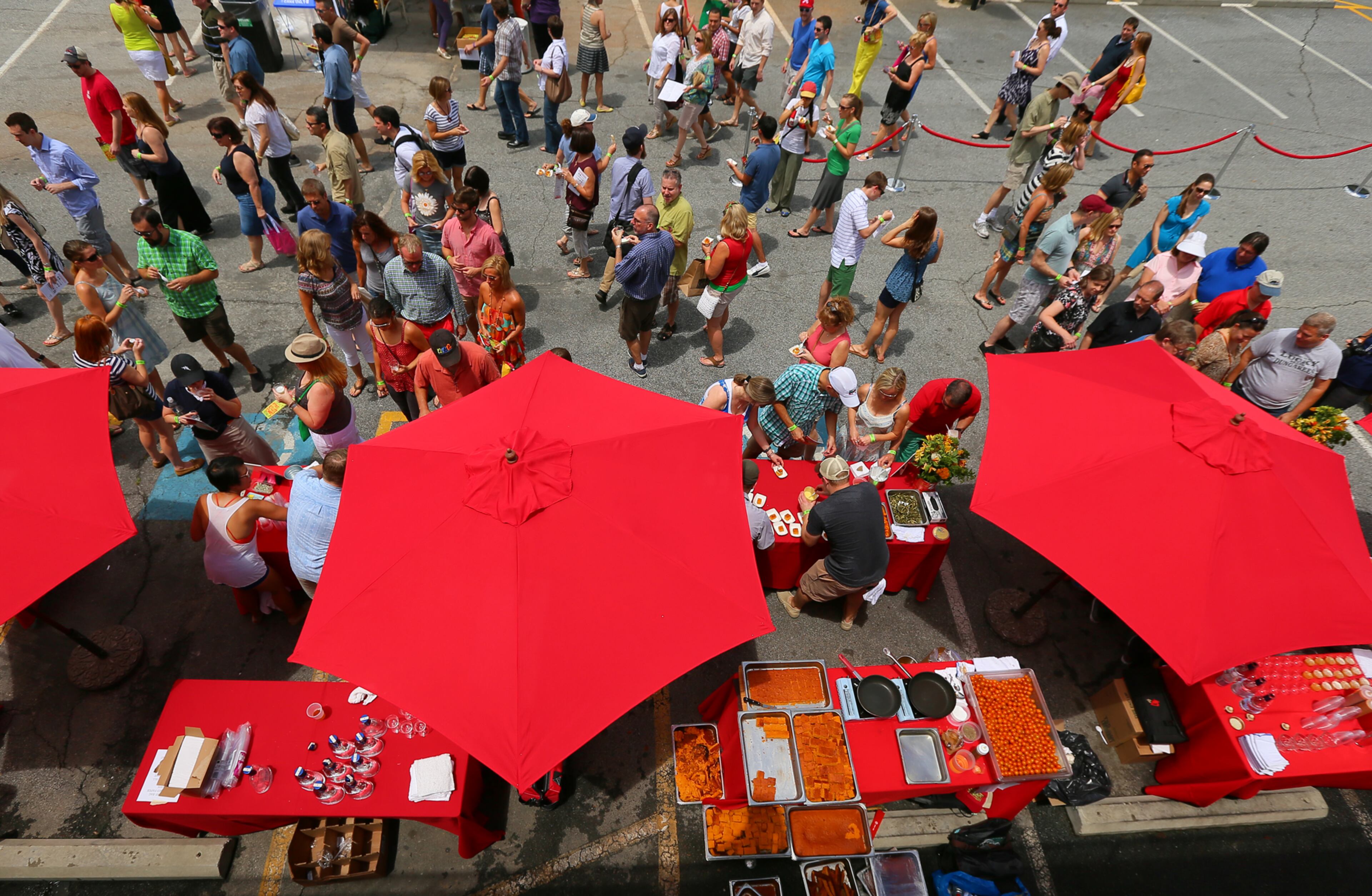 072113 ATLANTA: -- Hundreds arrive for the JCT.Kitchen & Bar annual Attack of the Killer Tomato Festival on Sunday, July 21, 2013, in Atlanta, to sample some of the Southeast's leading chefs and mixologists dishes and cocktail concoctions. CURTIS COMPTON / CCOMPTON@AJC.COM