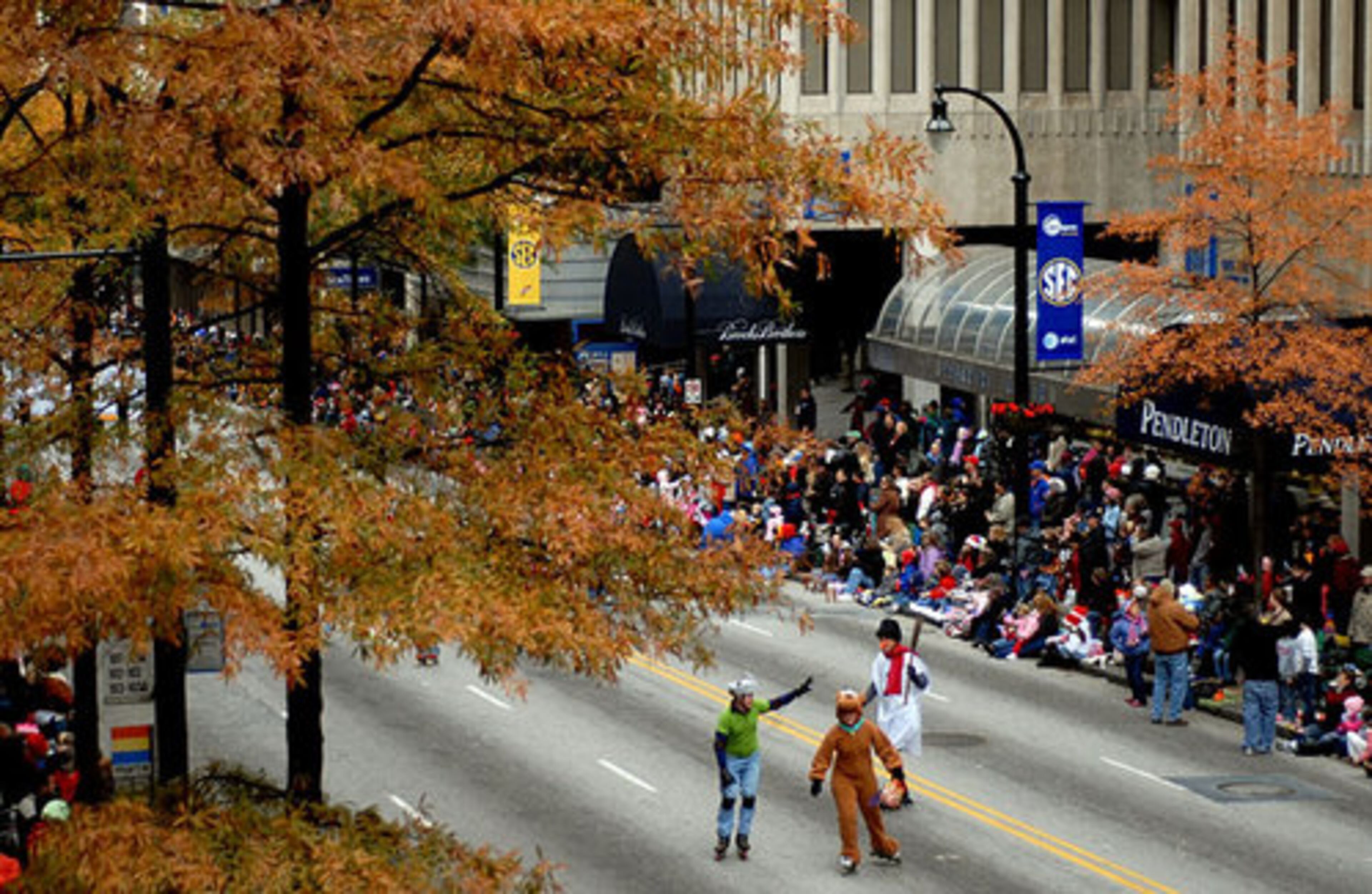 People lined Peachtree Street on Saturday to watch the Children's Healthcare of Atanta Christmas Parade. The event marks the beginning of the holiday festivities in Atlanta.