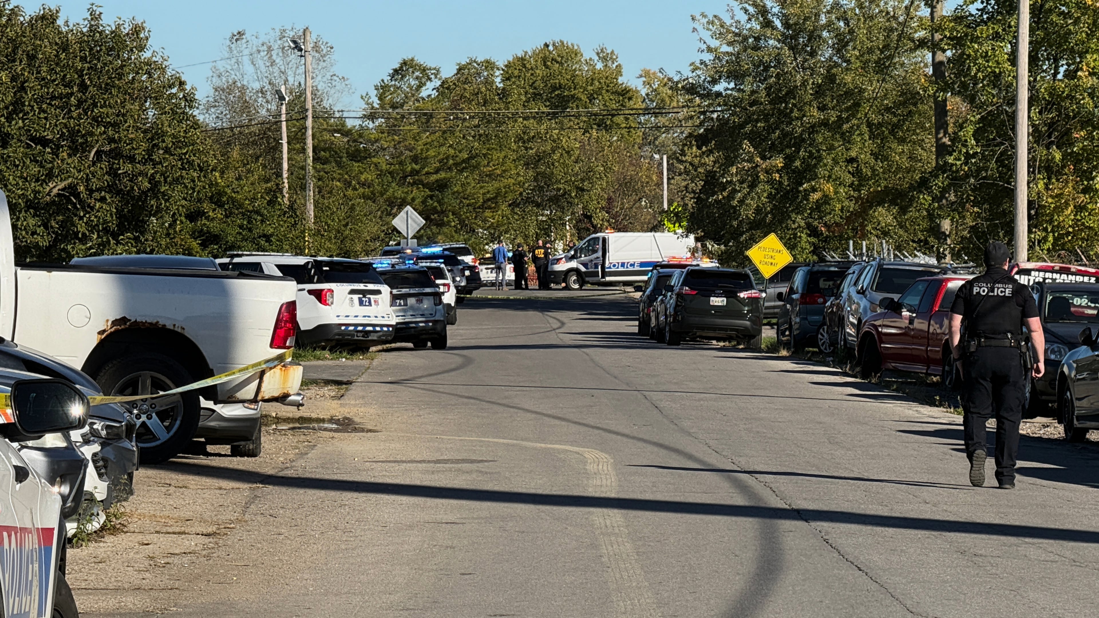 Law enforcement respond to the scene of a shooting Monday, Oct. 19, 2026, in Columbus, Ohio. (AP Photo/Patrick Aftoora-Orsagos)