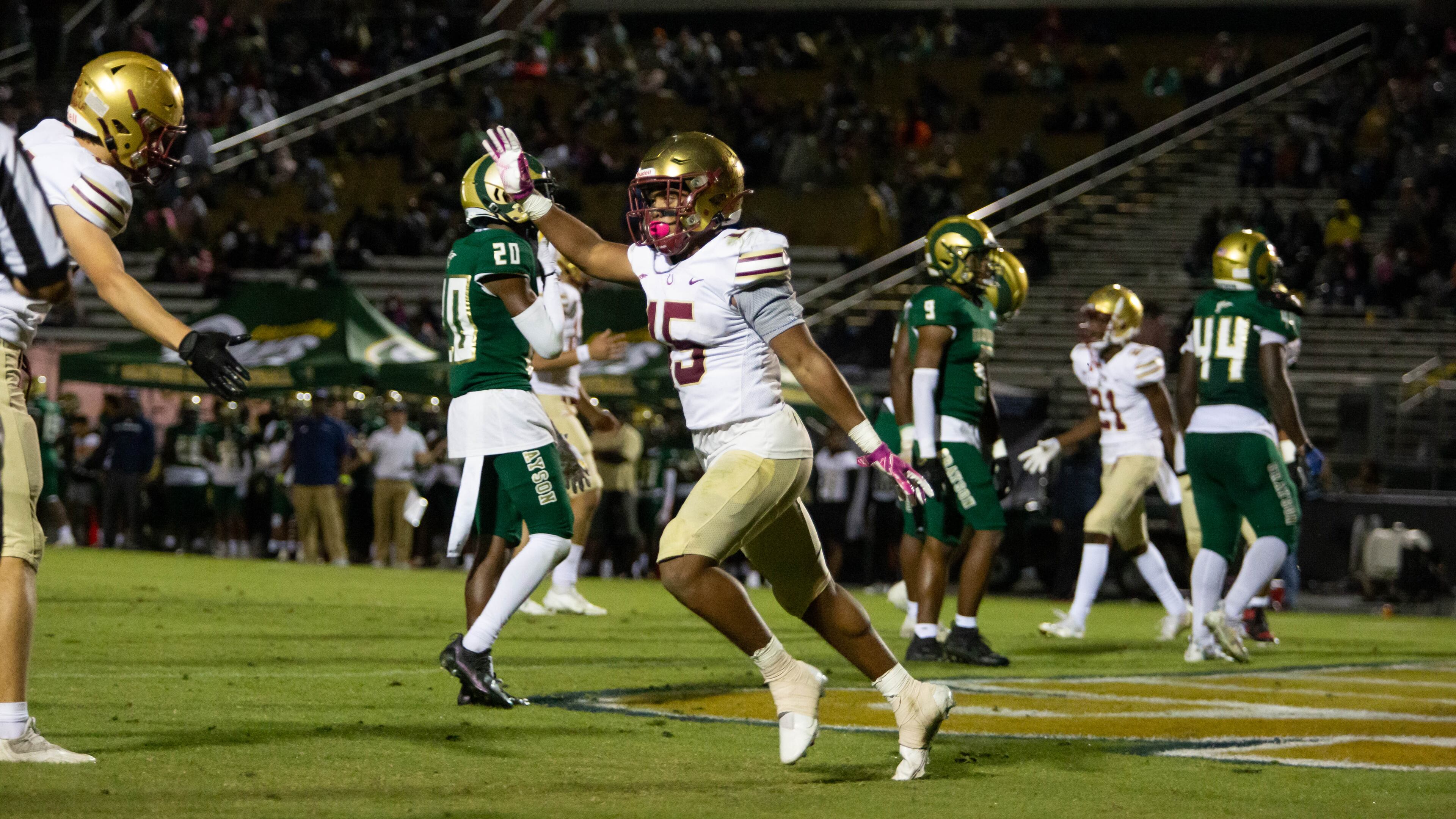 Brookwood's Alexander Diggs (15) celebrates a touchdown during a GHSA high school football game between the Grayson Rams and the Brookwood Broncos at Grayson High School in Loganville, Ga. on Friday, October 22, 2021. (Photo/Jenn Finch)