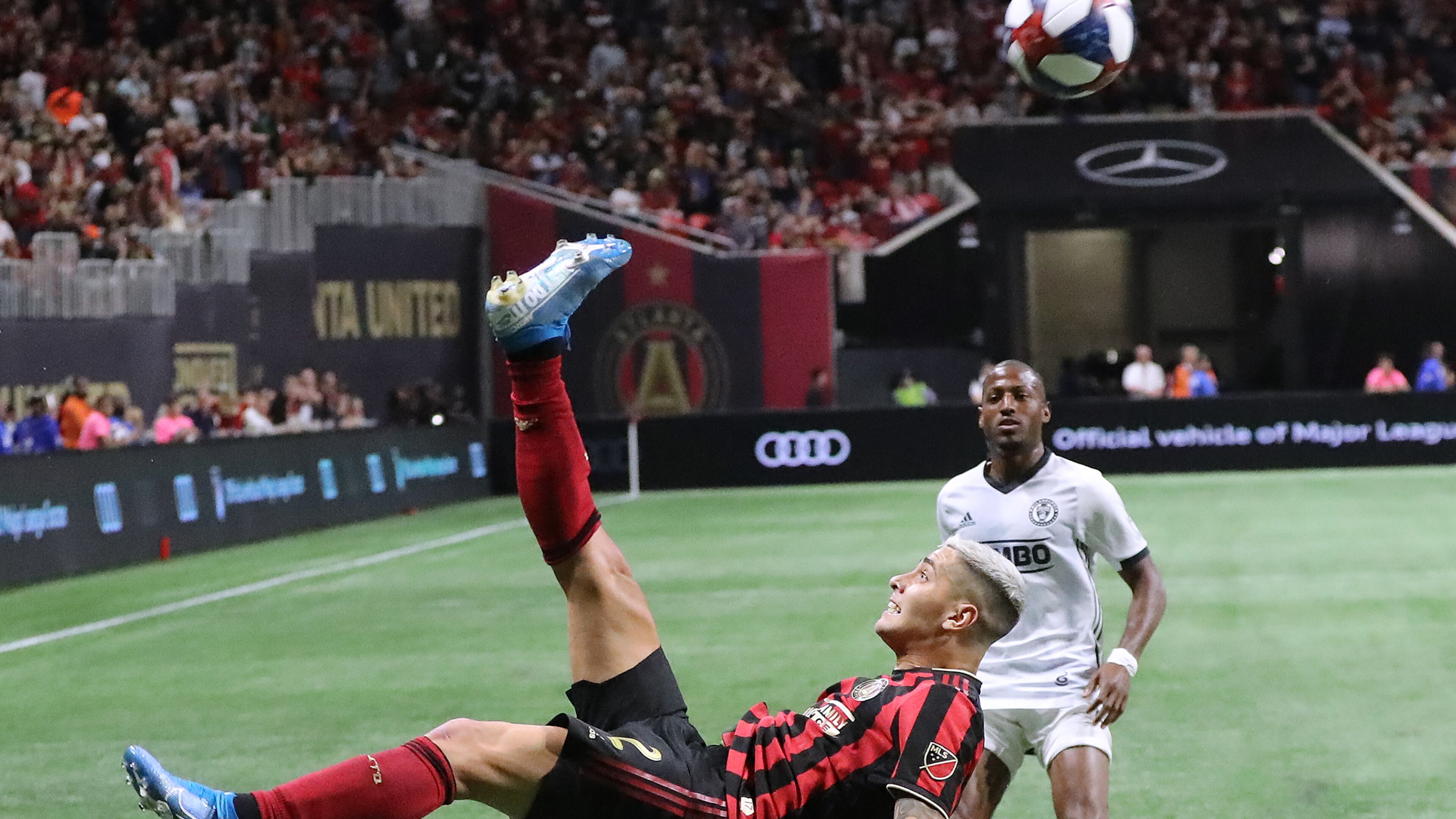 Atlanta United player Franco Escobar makes a bicycle kick pass to Josef Martinez against Philadelphia in the Eastern Conference semifinals of the MLS playoffs on Thursday, October 24, 2019, in Atlanta. Curtis Compton/ccompton@ajc.com