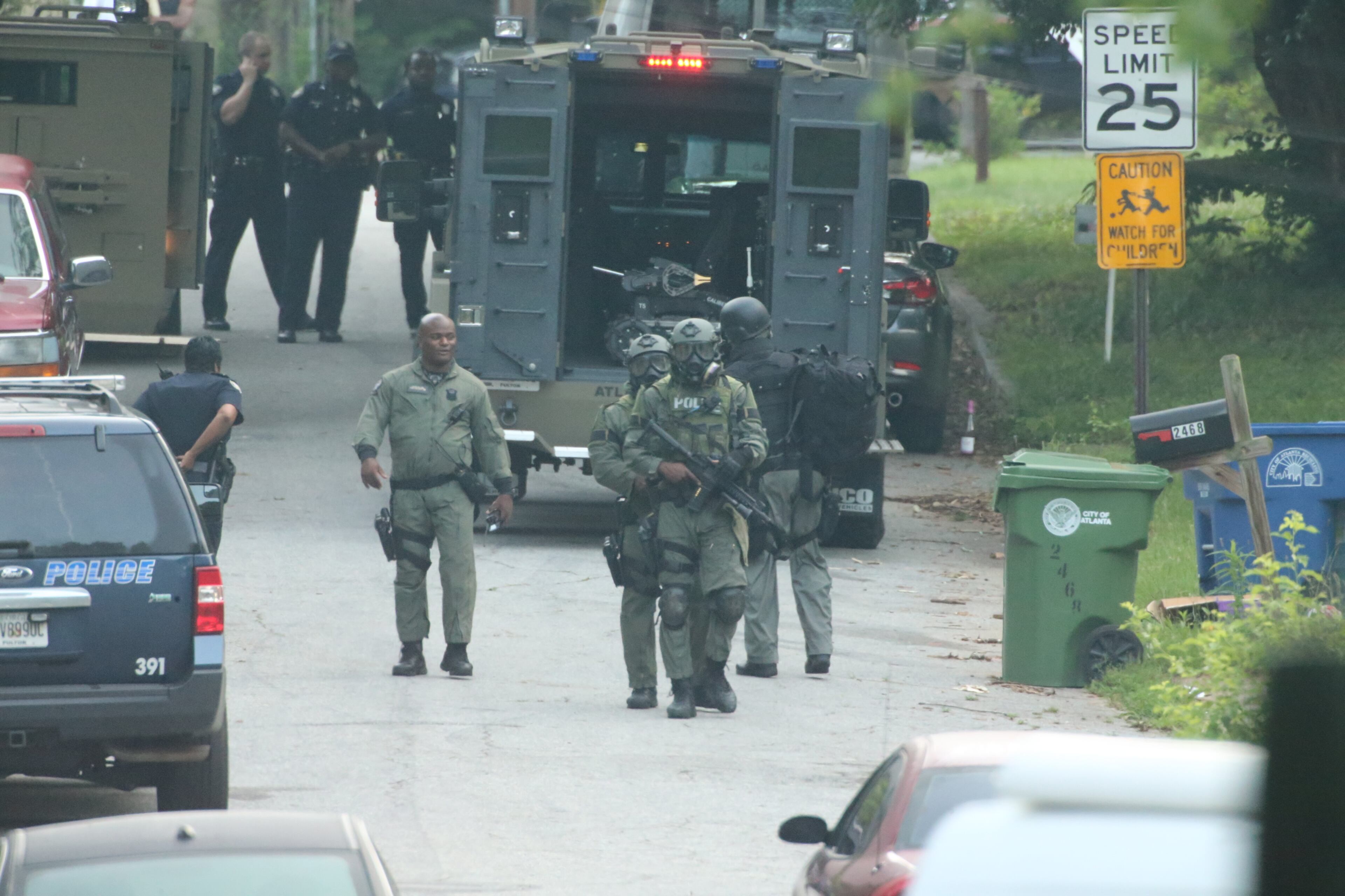 The incident began around 1:30 a.m. with reports of a man pulling a gun on a woman at a home in the 2400 block of Baxter Street. JOHN SPINK/JOHNSPINK@AJC.COM