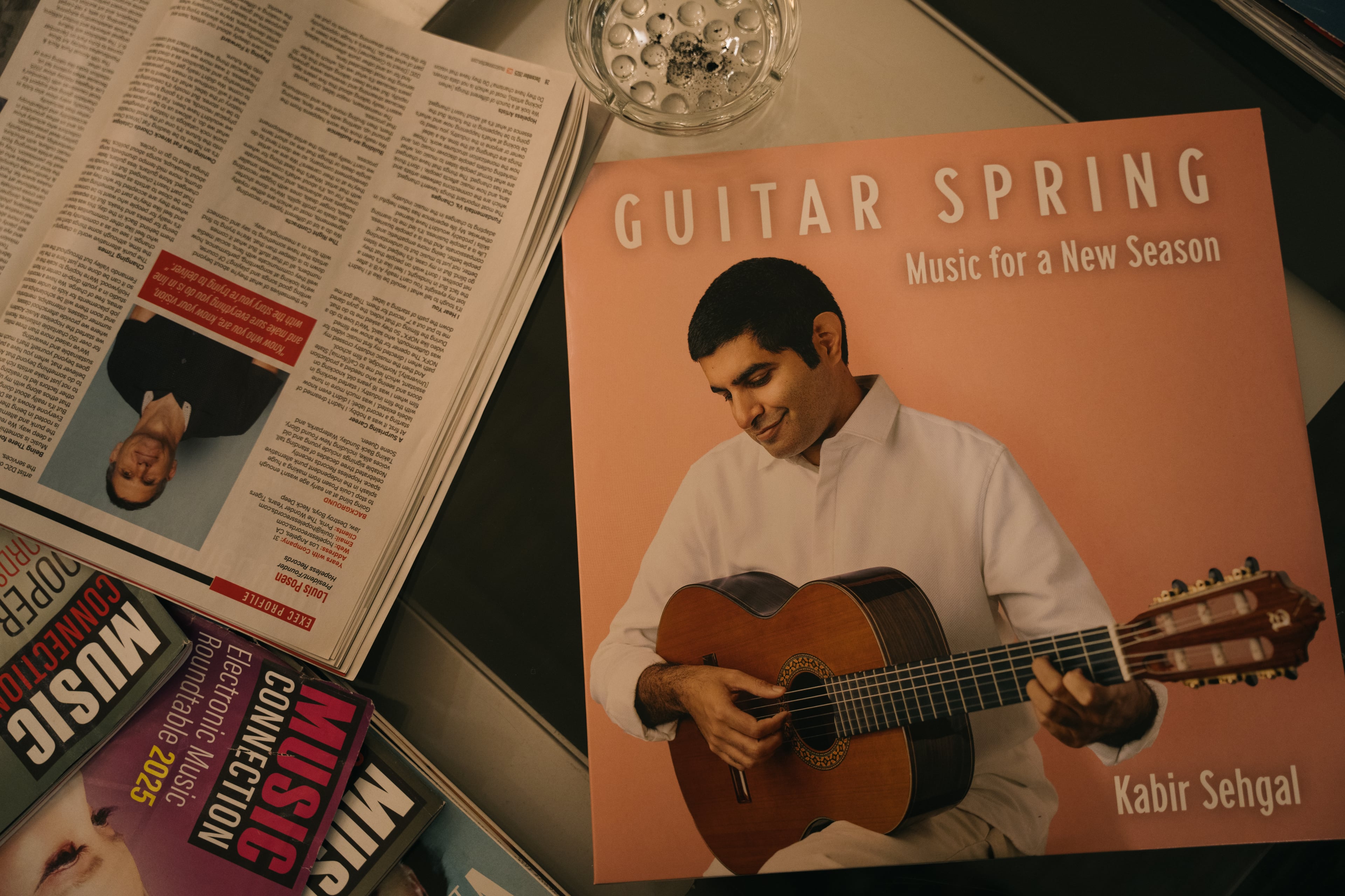 Kabir Sehgal's record "Guitar Spring" sits on a table at Tree Sound Studios in Norcross. (Olivia Bowdoin/AJC)