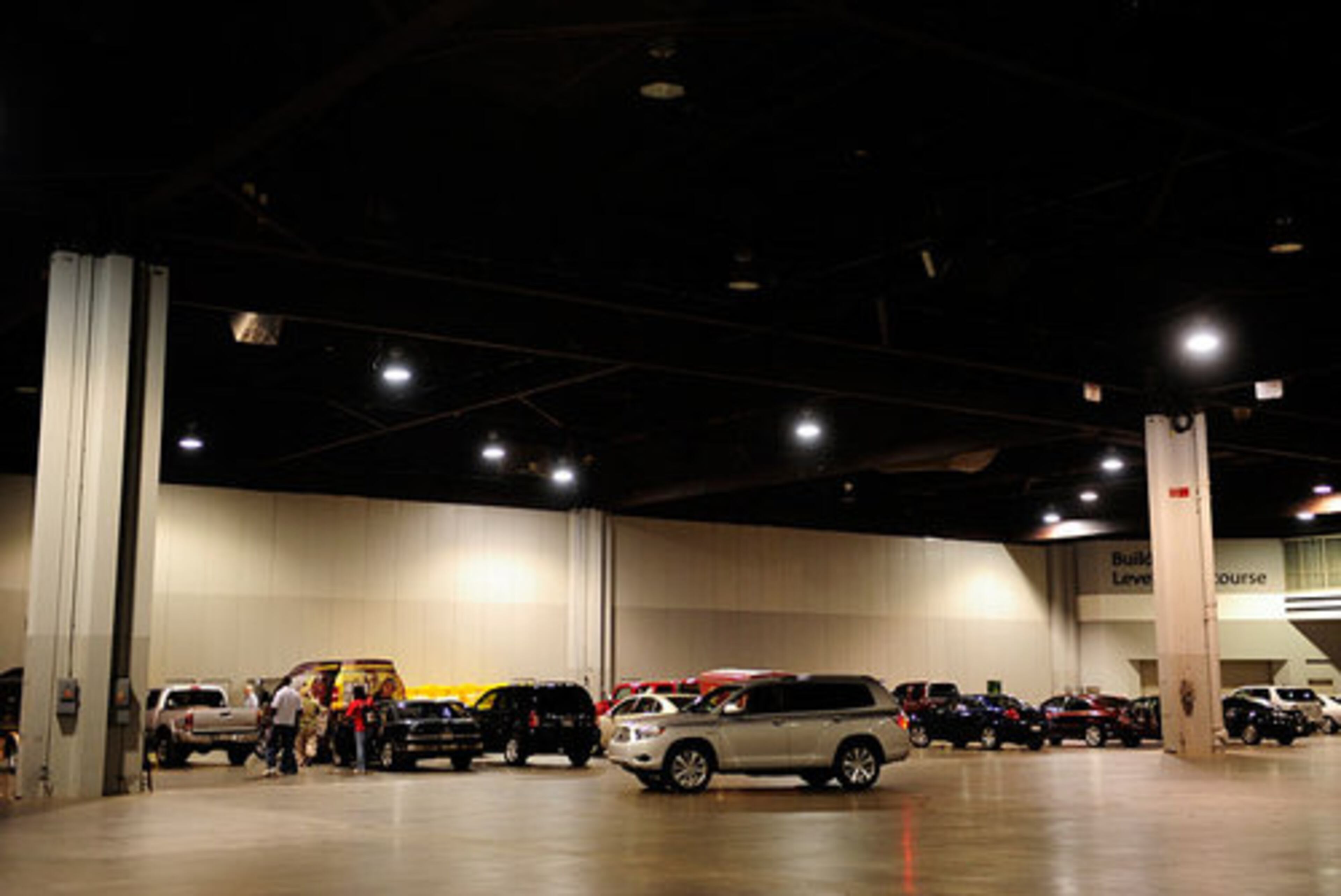 Motor enthusiasts prepare their cars and motorcycles for the V-103 Car and Bike Show.
