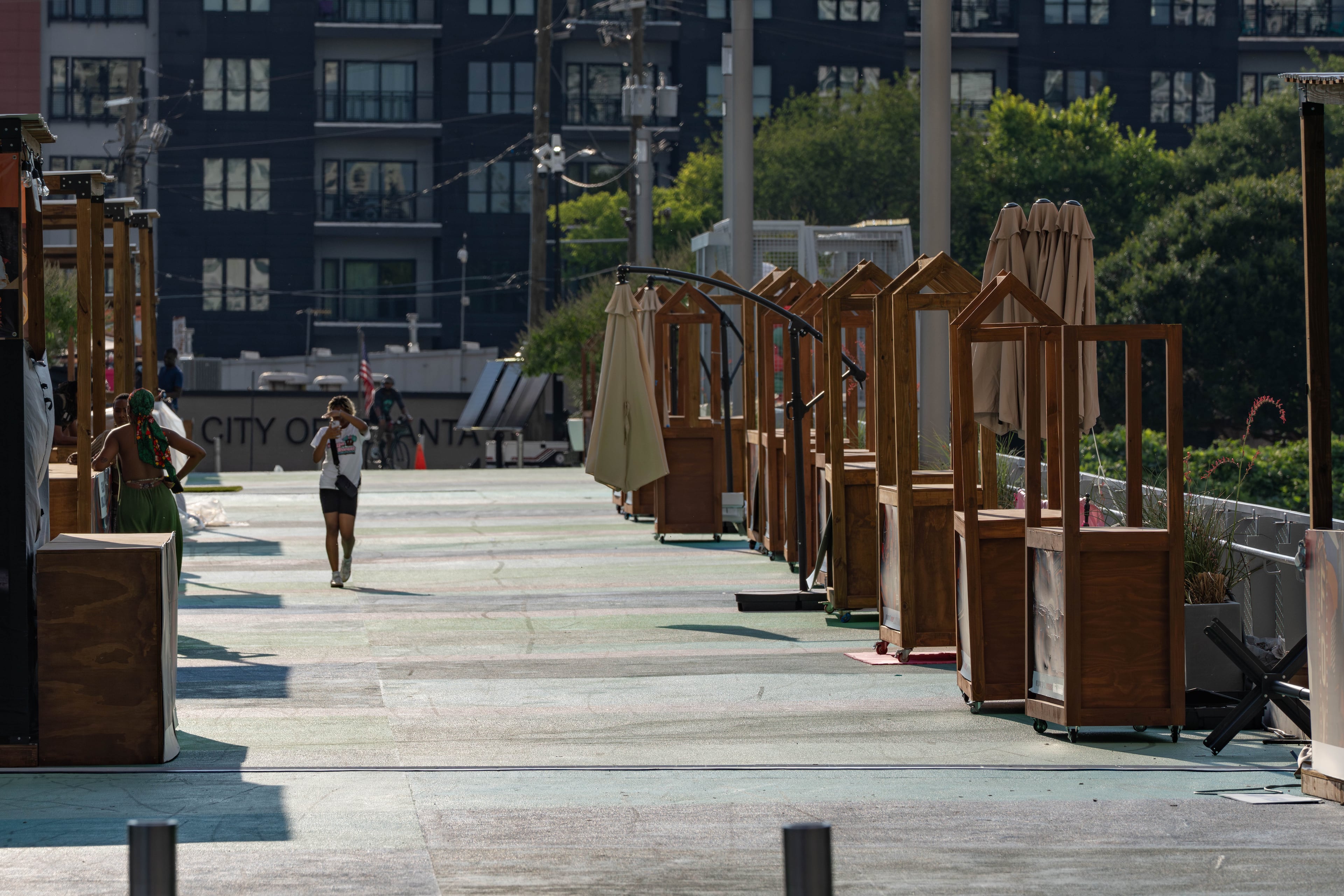 Vendor booths sit empty along the Steele Bridge in downtown Atlanta on Wednesday, June 24, 2026. (Ben Hendren for the AJC)