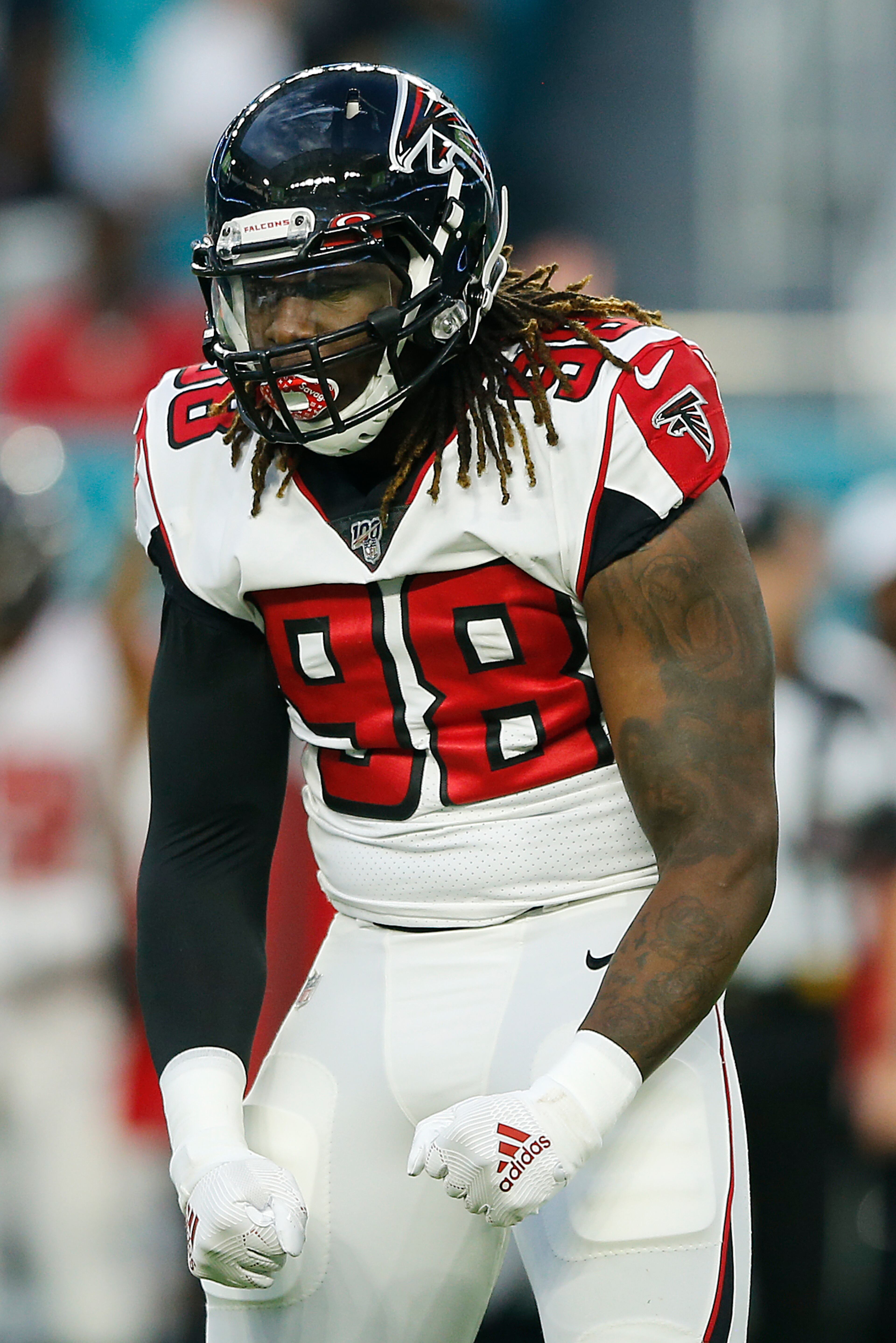 Takkarist McKinley #98 of the Atlanta Falcons reacts after a tackle against the Miami Dolphins during the first quarter of the preseason game at Hard Rock Stadium on August 08, 2019 in Miami, Florida. (Photo by Michael Reaves/Getty Images)