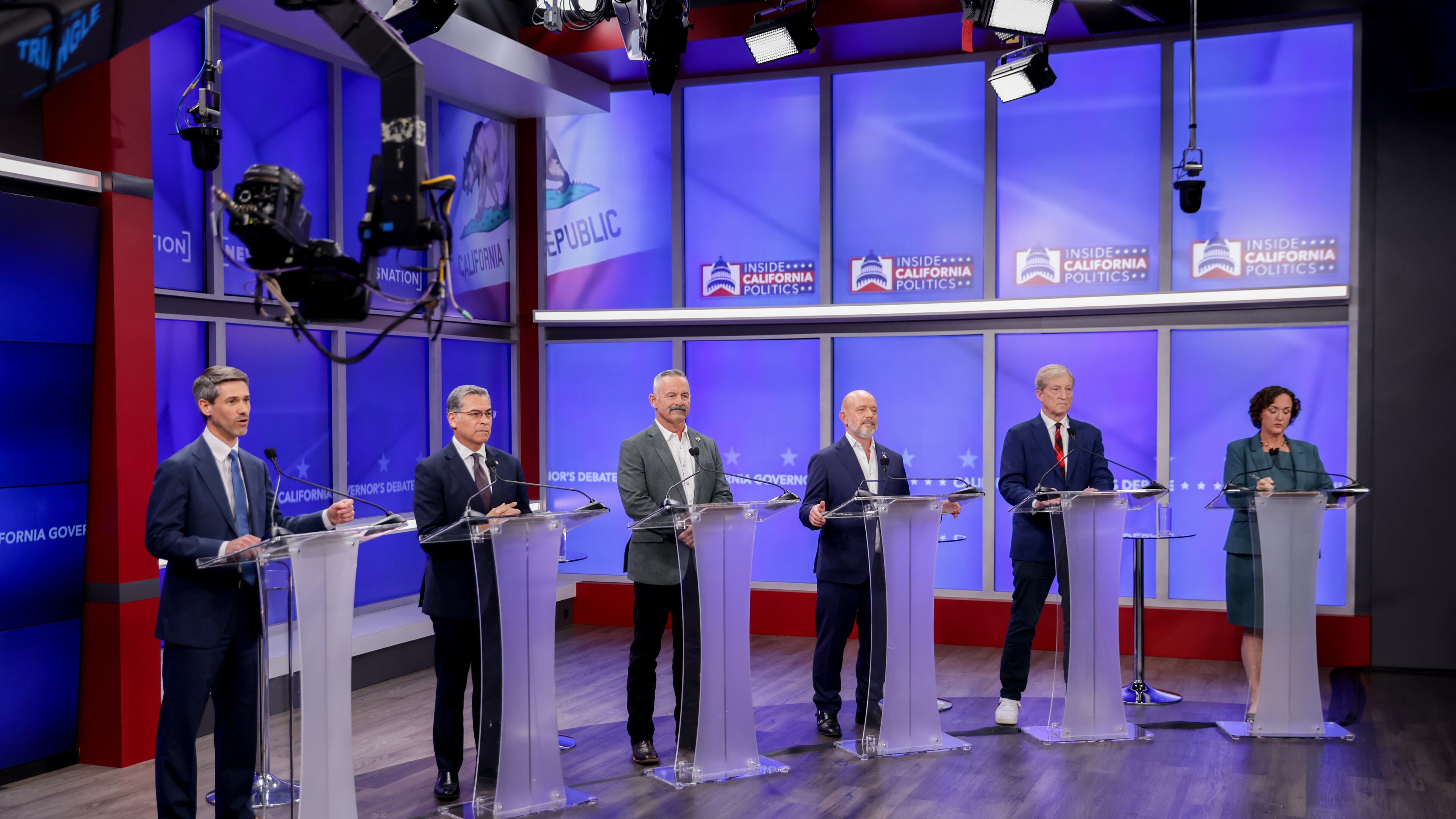Candidates in California's gubernatorial race look on during a debate Wednesday, April 22, 2026, in San Francisco. (Jason Henry/Pool Photo via AP)