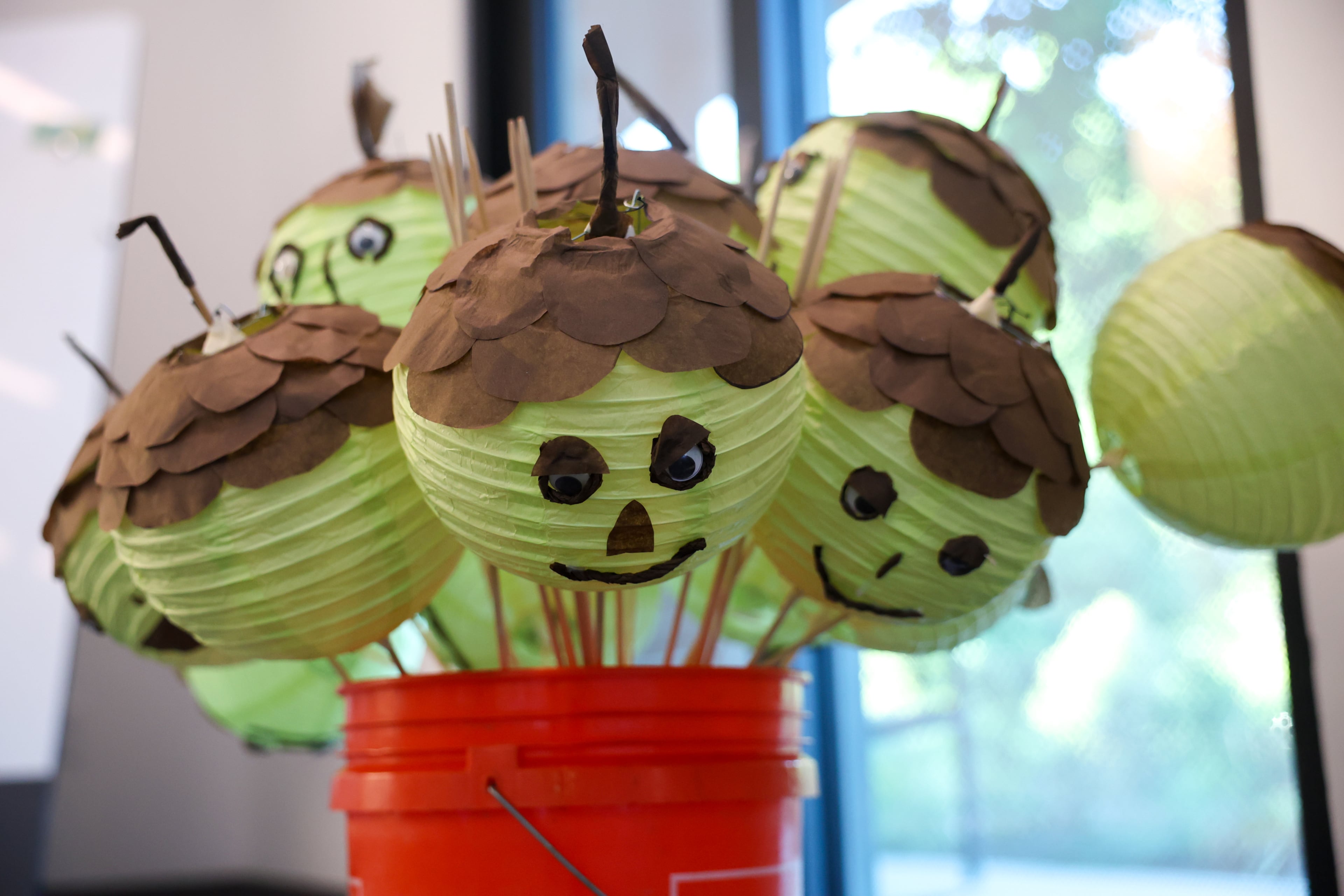 Acorn lantern puppets for the Atlanta Beltline Lantern Parade are stored in a bucket at Trees Atlanta in Atlanta on Thursday, Sept. 10, 2026. (Arvin Temkar/AJC)