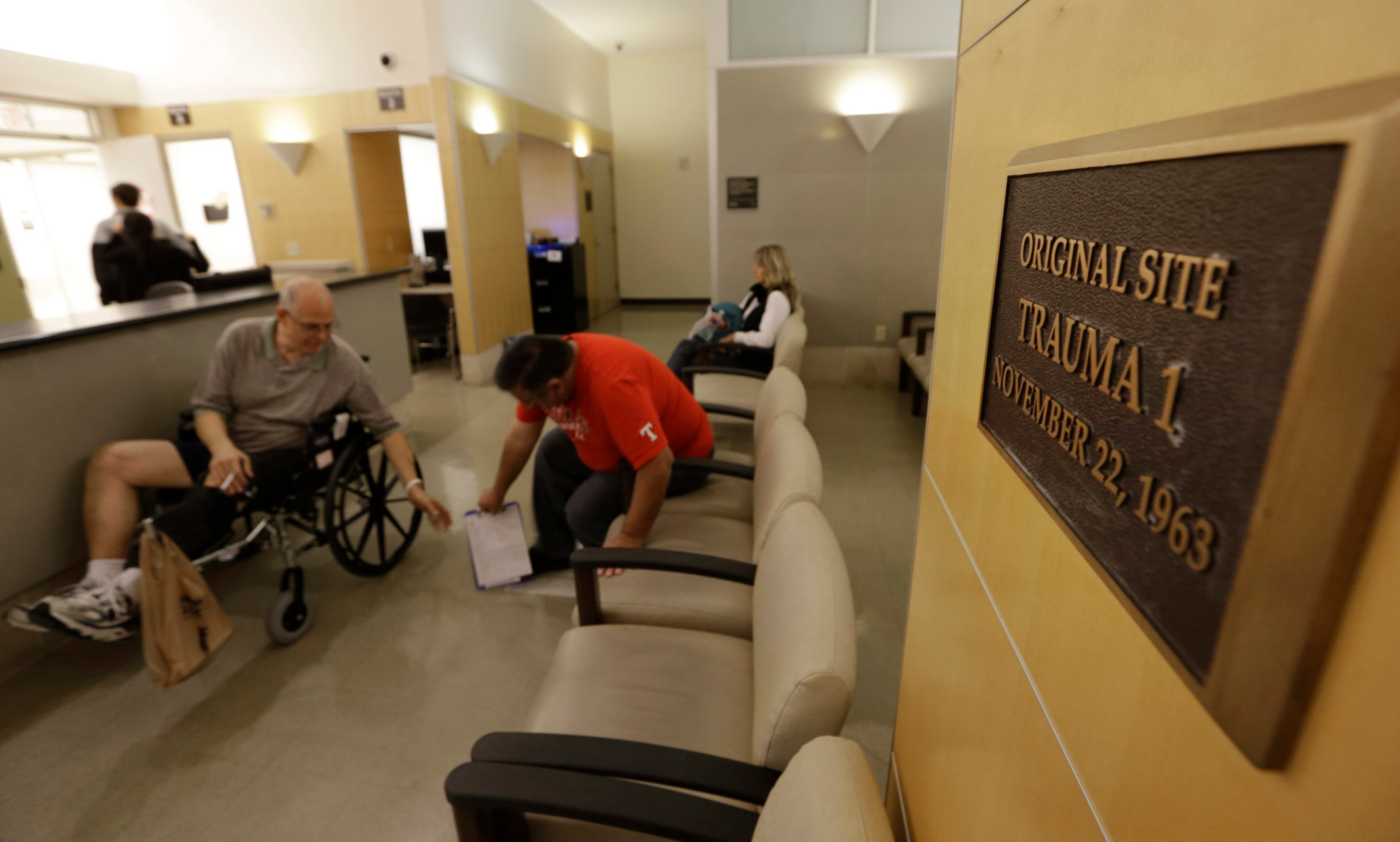 Today, a plaque marks the original site of Trama Room 1 where doctors rushed to treat the mortally wounded President John F. Kennedy at Parkland Memorial Hospital in Dallas. The Trauma Room 1 of Nov. 22, 1963, no longer exists and is now the radiology department at the hospital. (AP Photo/LM Otero)