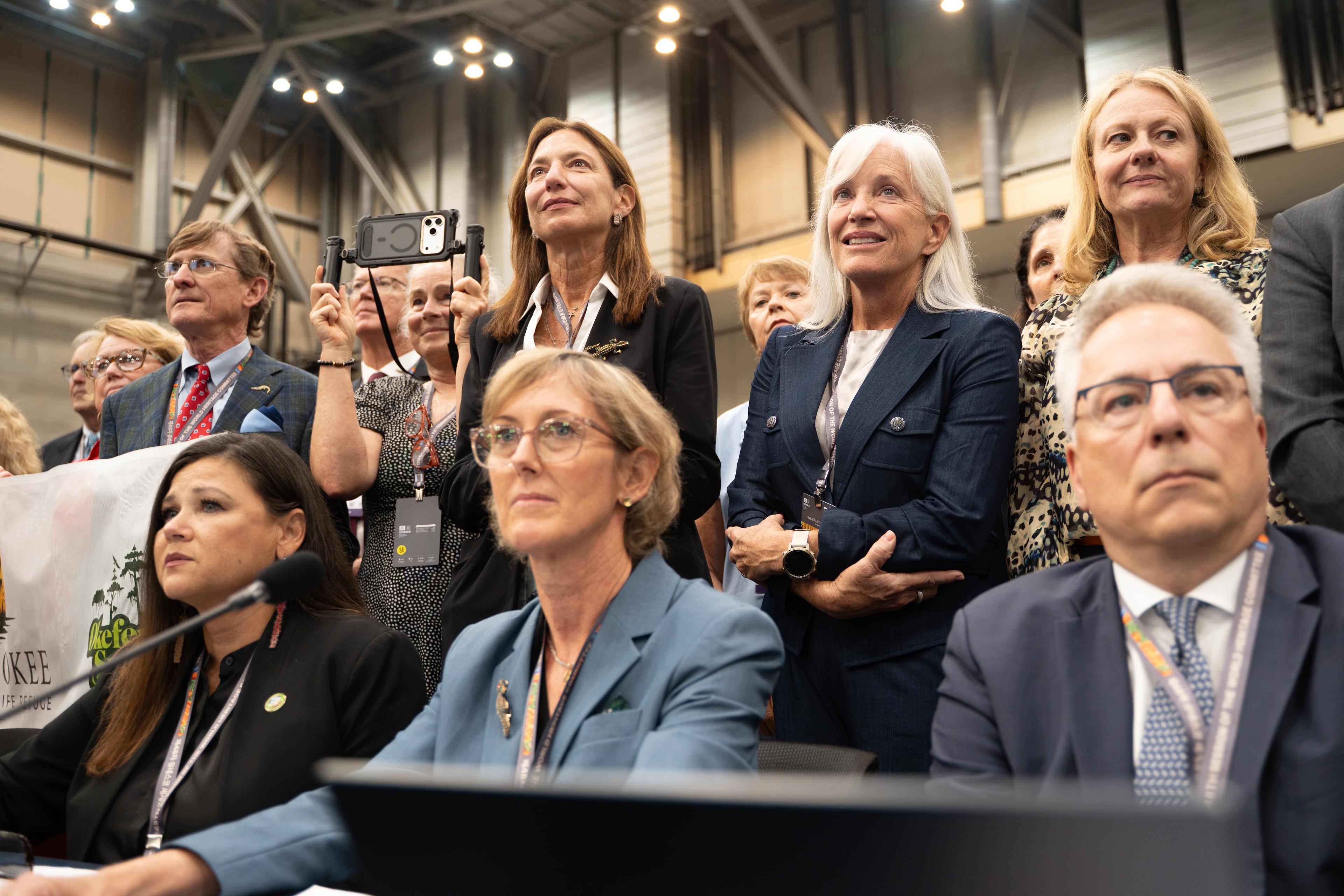 A Georgia contingent was on hand Saturday, July 25, 2026, to witness the Okefenokee National Wildlife Refuge being added to the UNESCO World Heritage List by the World Heritage Committee at its 48th annual session in Busan, South Korea. Front row from left are Tracie Revis, Kim Bednarek and Cyril Kormos. The back row from left are Joe Montgomery, Marise Nazzaro (holding camera), Rena Ann Peck, Claire LaBrunerie and Haile McCollum. (Hwawon Ceci Lee for the AJC)