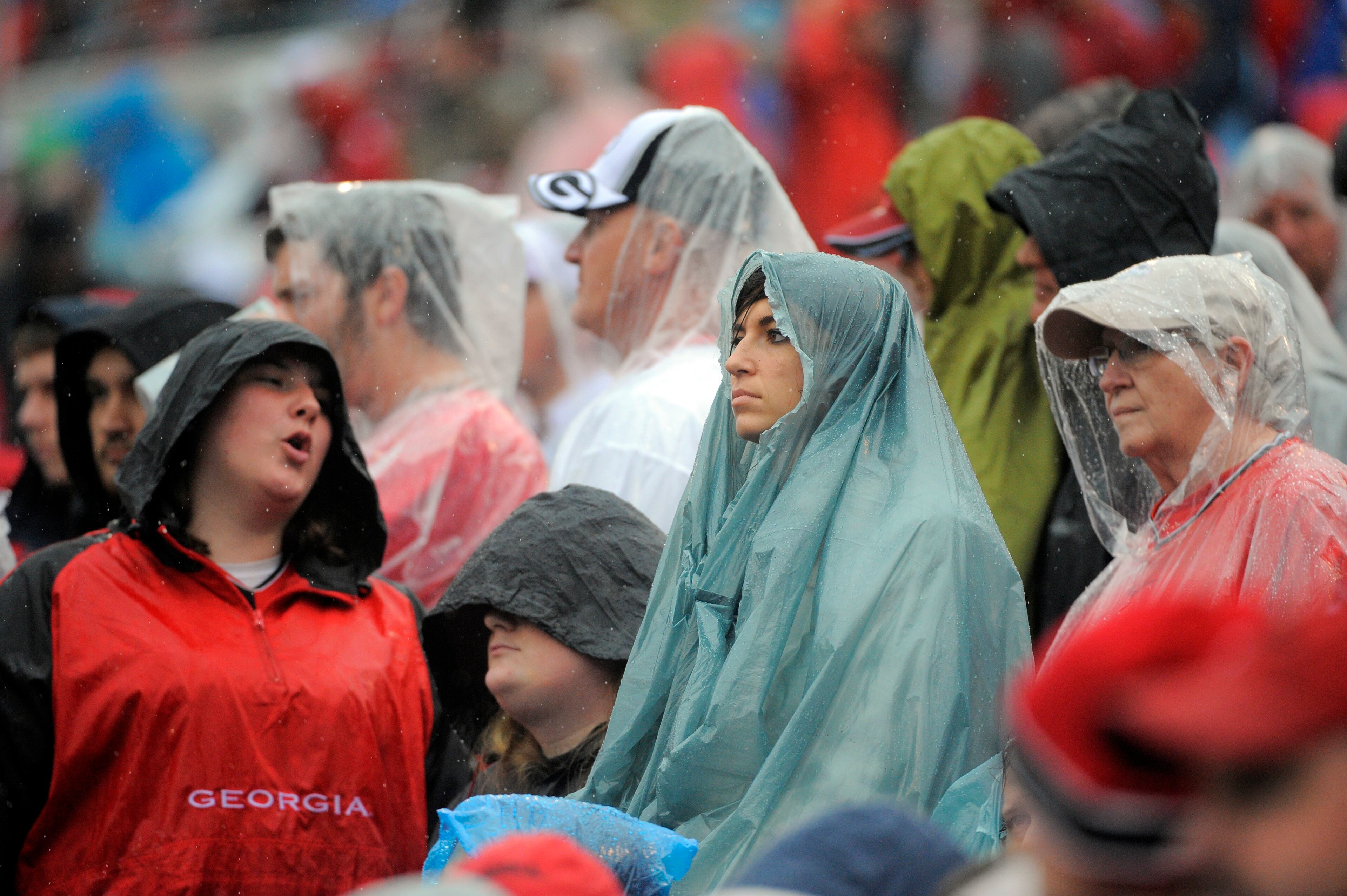 A group of Georgia fans watch the final minutes tick down during the second half of the Gator Bowl NCAA college football game against Nebraska, Wednesday, Jan. 1, 2014, in Jacksonville, Fla. Nebraska beat Georgia 24-19. (AP Photo/Stephen B. Morton)