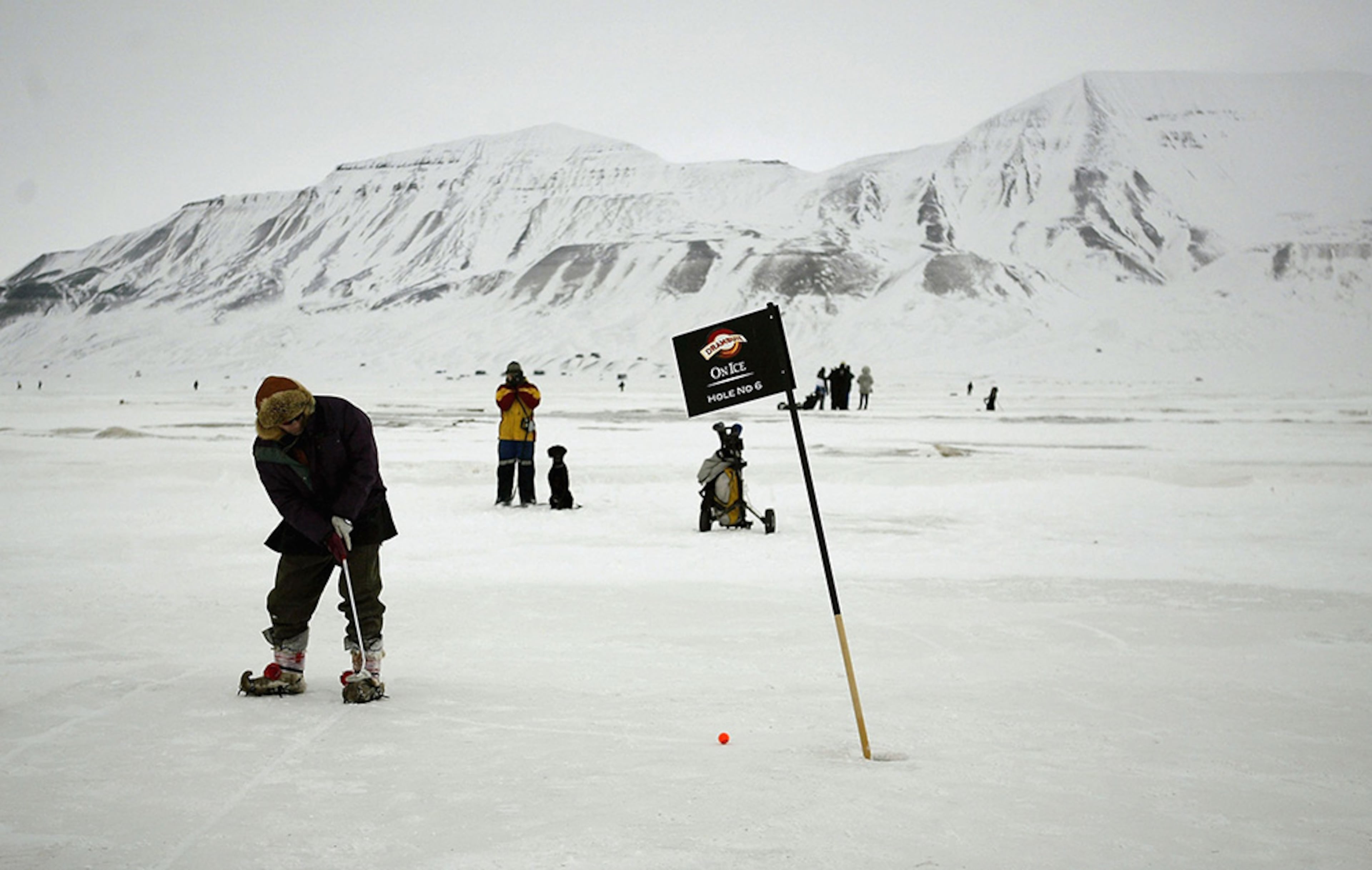 The World Ice Golf Championship At the Drambuie World Ice Golf Championship in Greenland started in 1997 and is played in temperatures nearing minus 58 degrees Fahrenheit. Brightly colored balls help players keep track of them in the white landscape.
