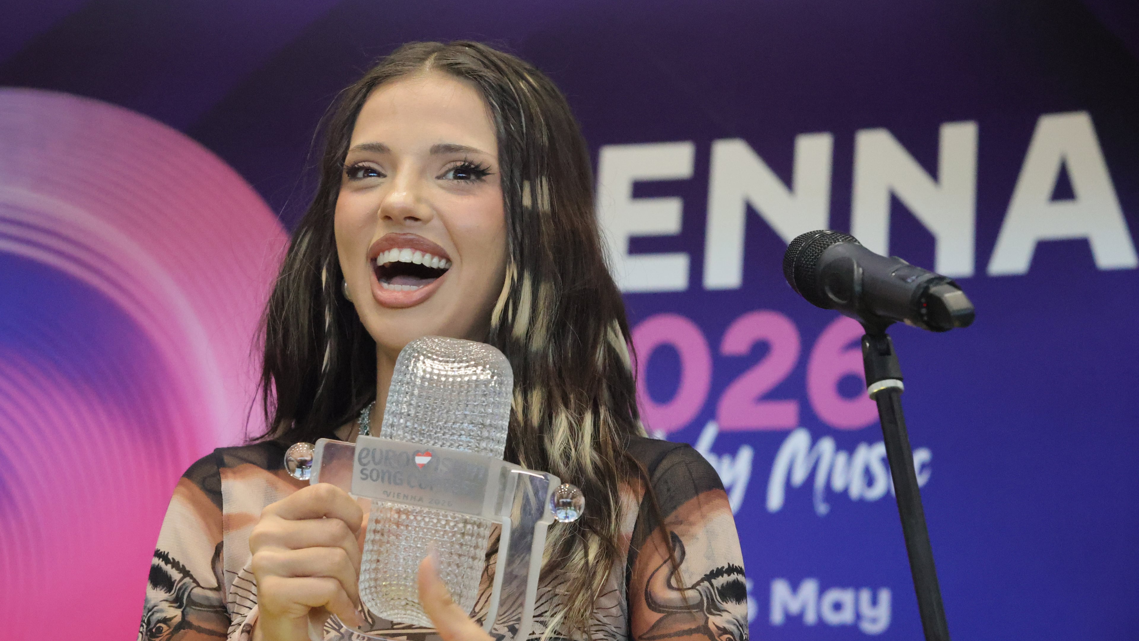 Eurovision 20026 winner Dara reacts upon her return home in Sofia on Sunday, May 17, 2026, giving the southeast European country its first-ever victory in the competition. (AP Photo/Valentina Petrova)